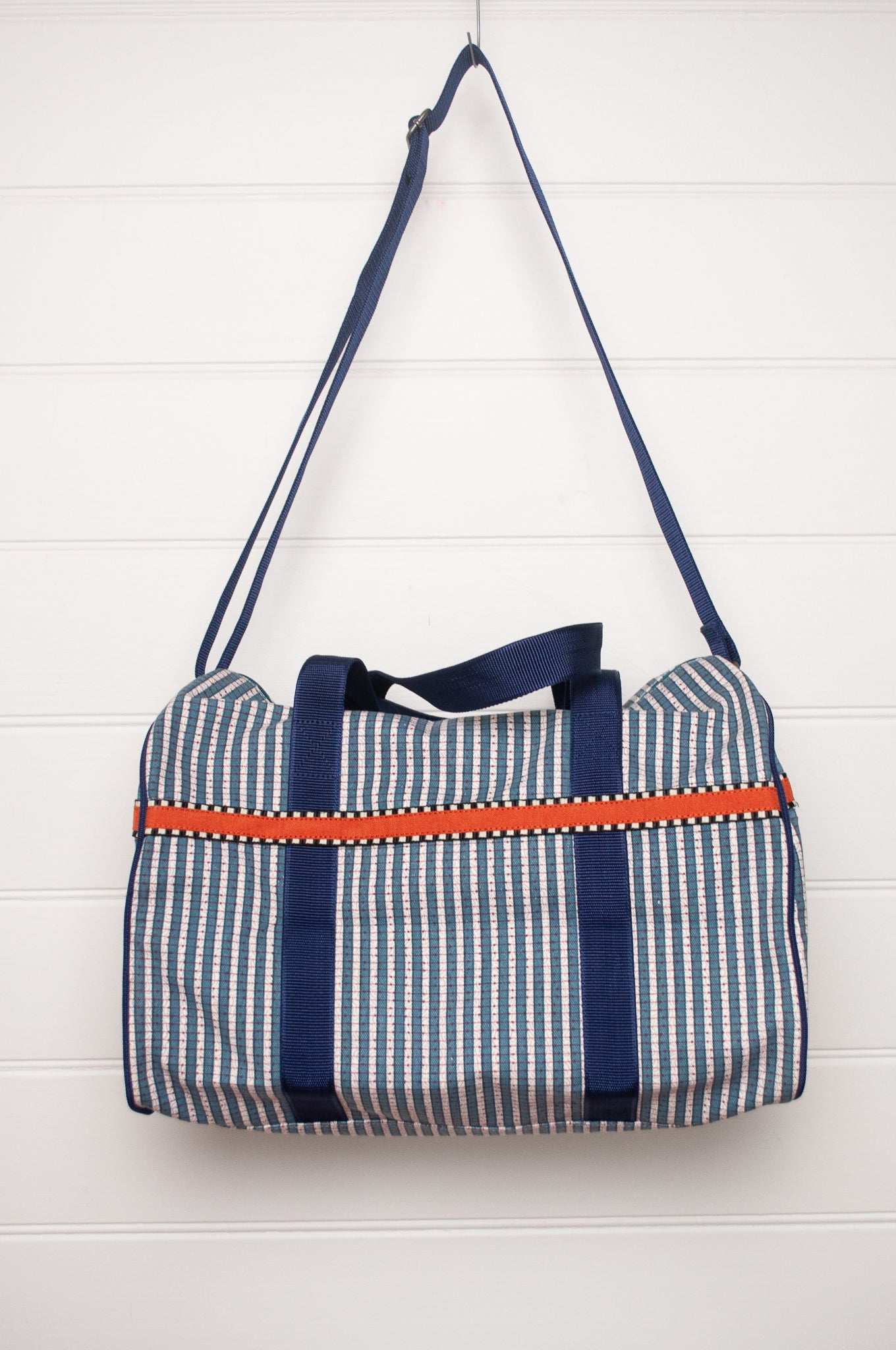 Anna Kaszer Helzip cotton canvas weekend duffle bag in blue stripe.