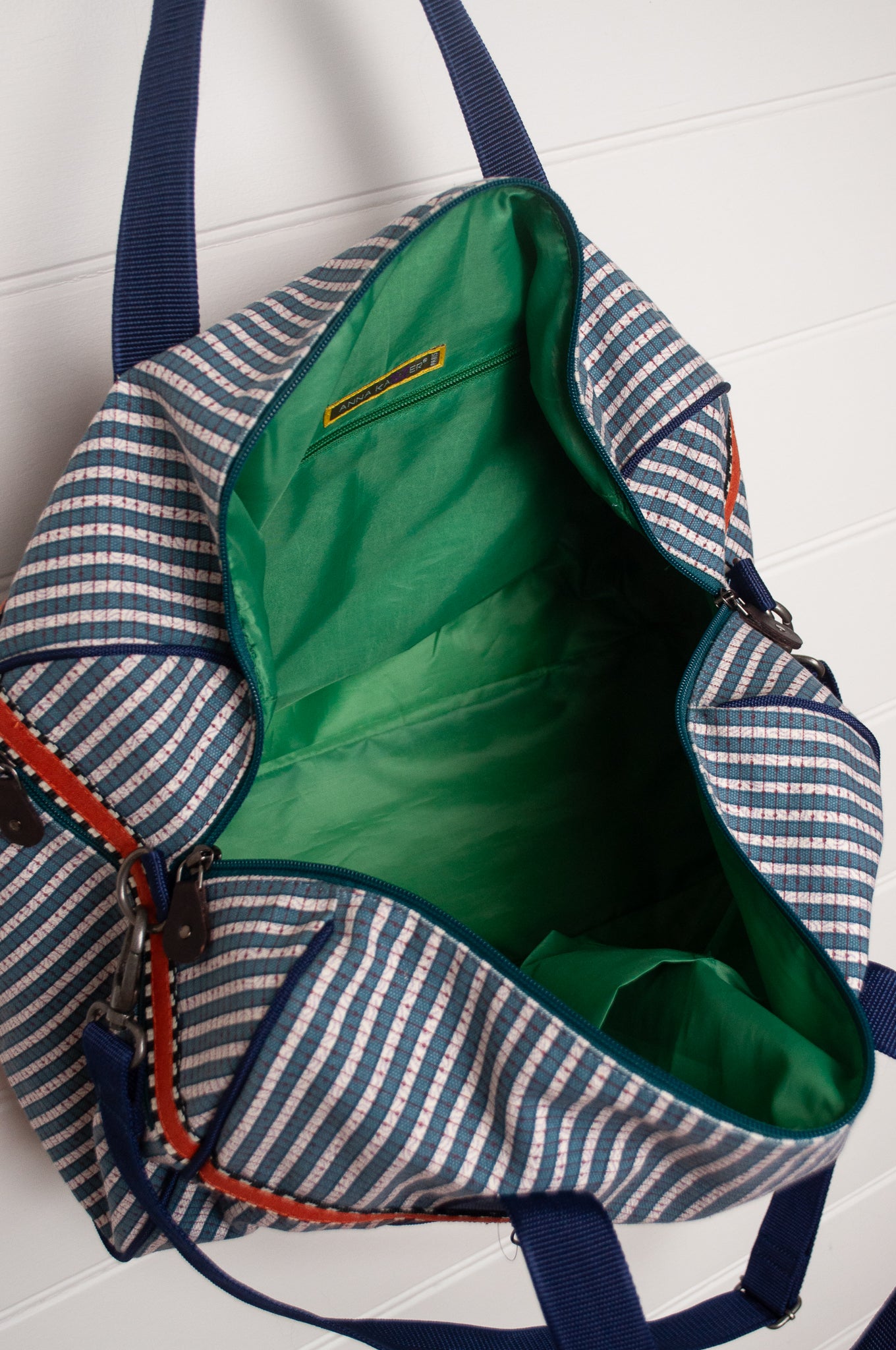 Anna Kaszer Helzip cotton canvas weekend duffle bag in blue stripe.
