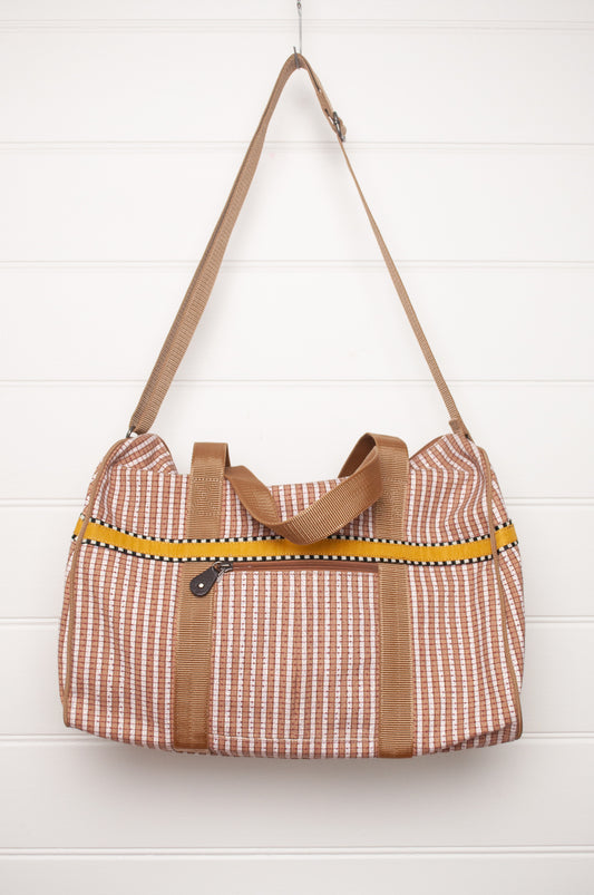 Anna Kaszer Helzip cotton canvas weekend duffle bag in mustard stripe.