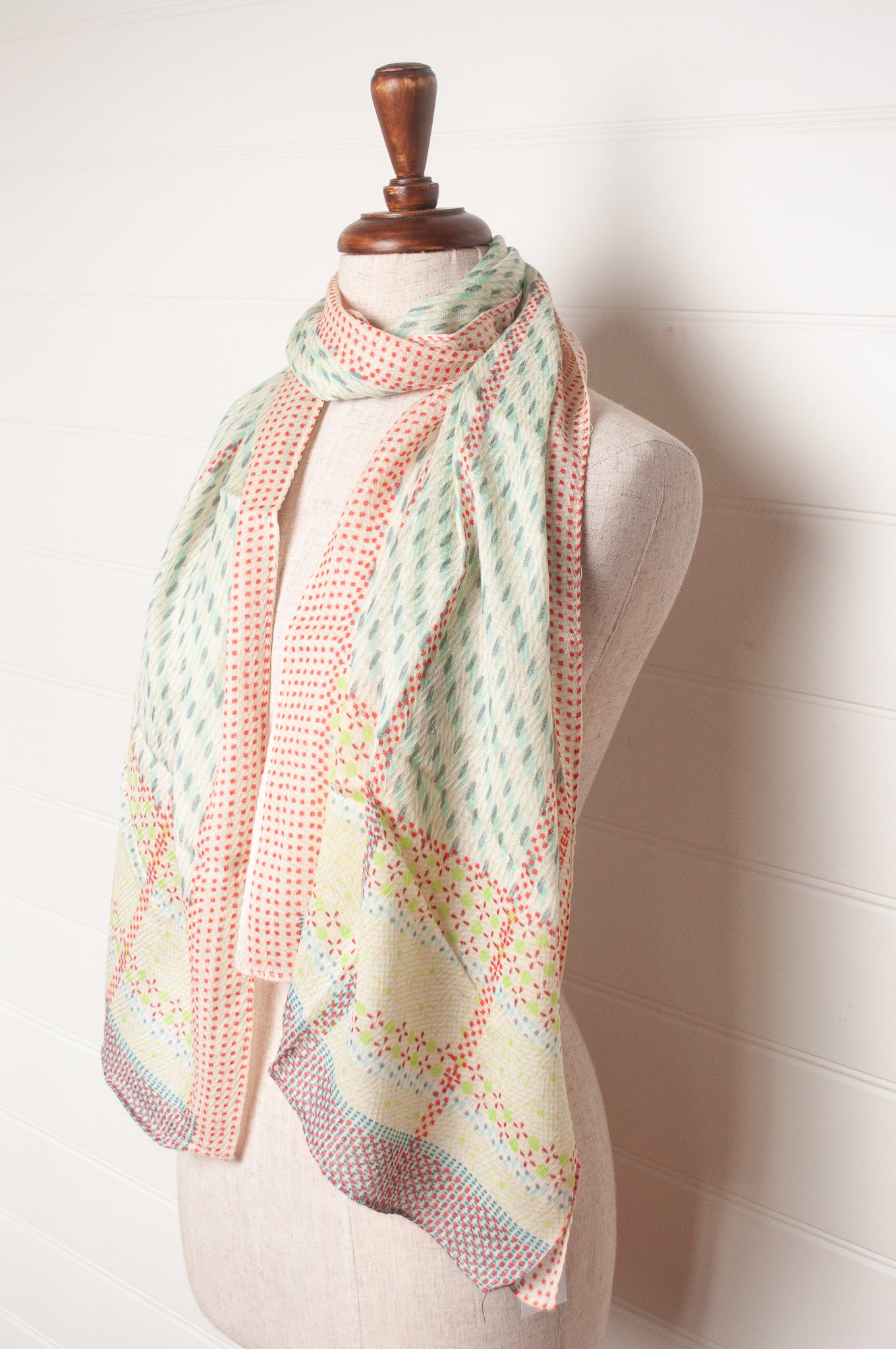 Anna Kaszer fine wool aqua and white scarf with red accents.