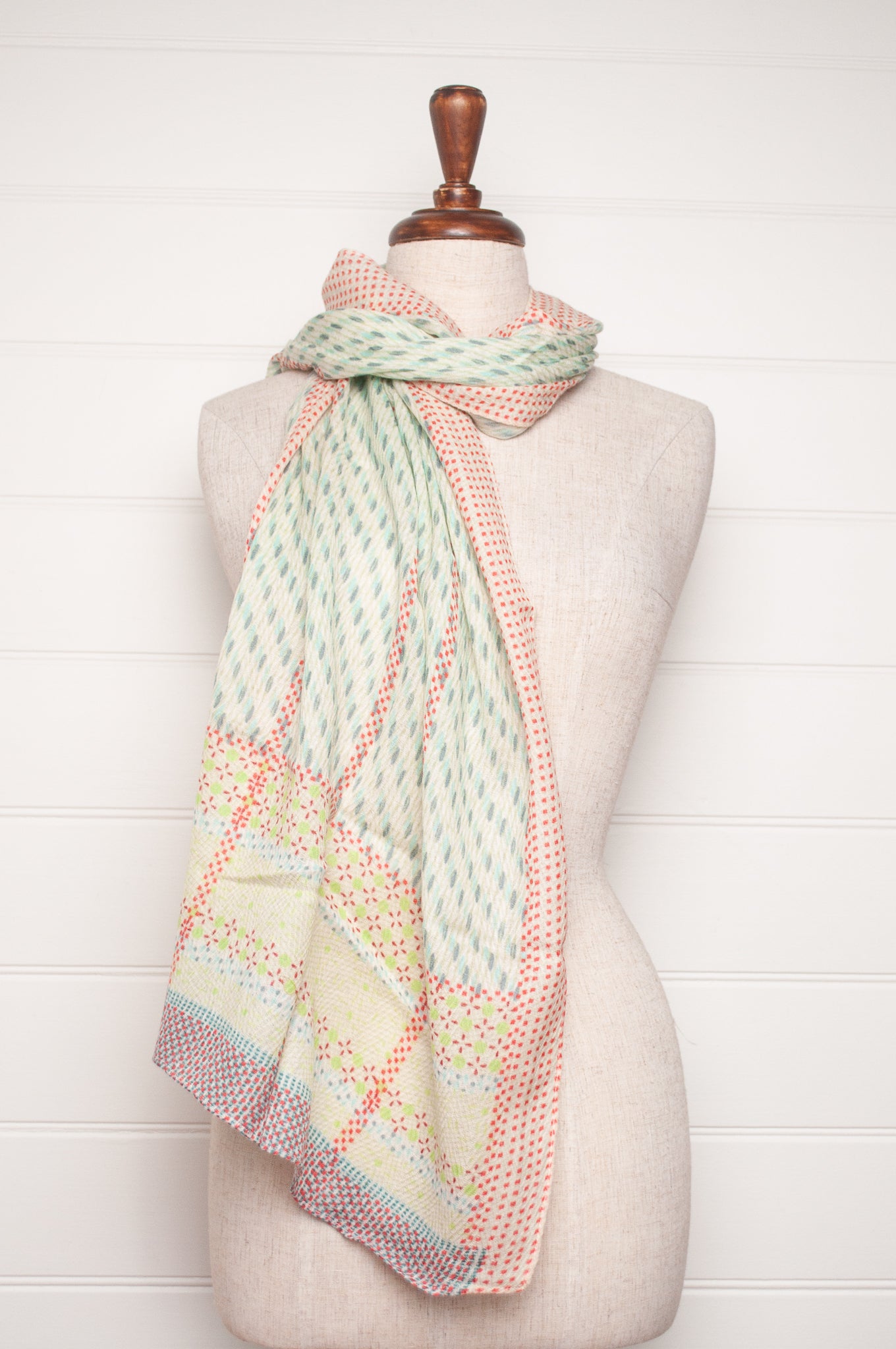 Anna Kaszer fine wool aqua and white scarf with red accents.