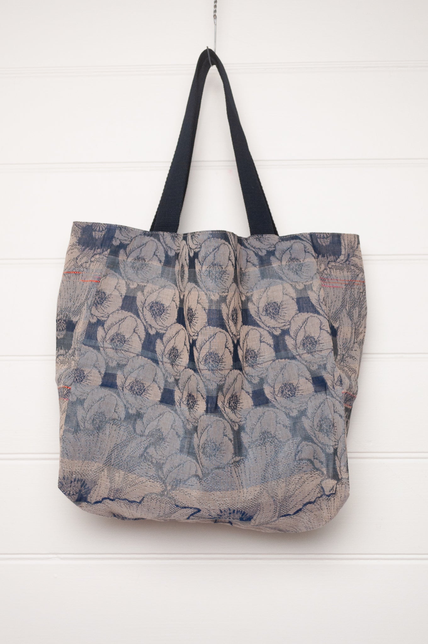 Letol organic cotton jacquard weave tote bag floral design in shades of blue.