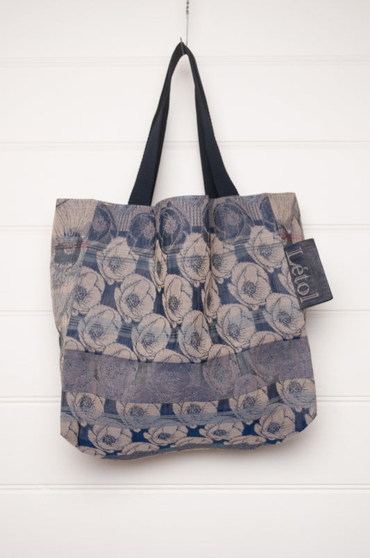Letol organic cotton jacquard weave tote bag floral design in shades of blue.