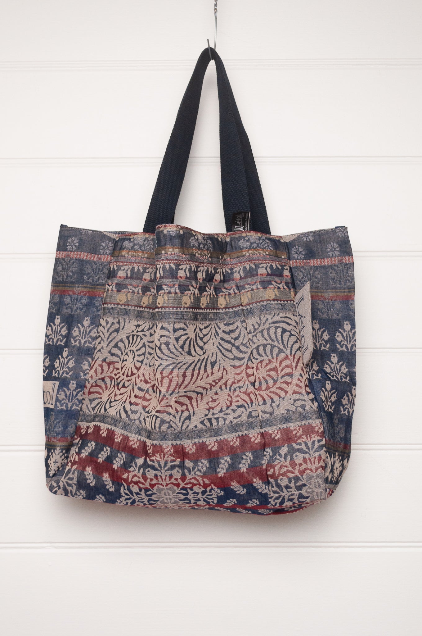Letol organic cotton jacquard weave tote bag floral design in shades of blue.