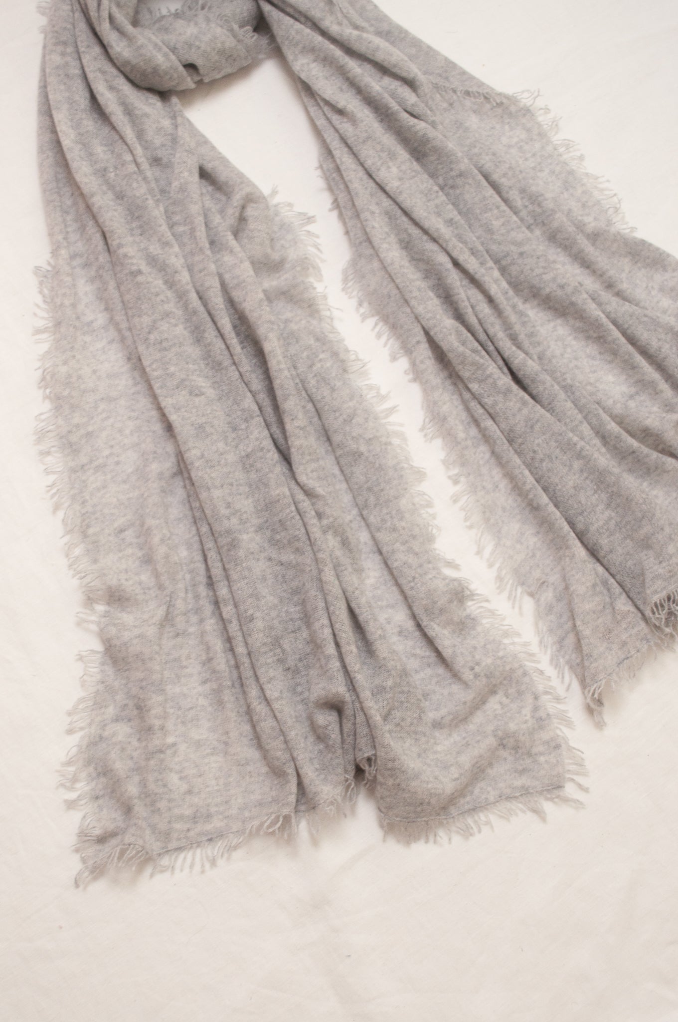 Pure cashmere, lightweight knit fringed scarf in ash grey.