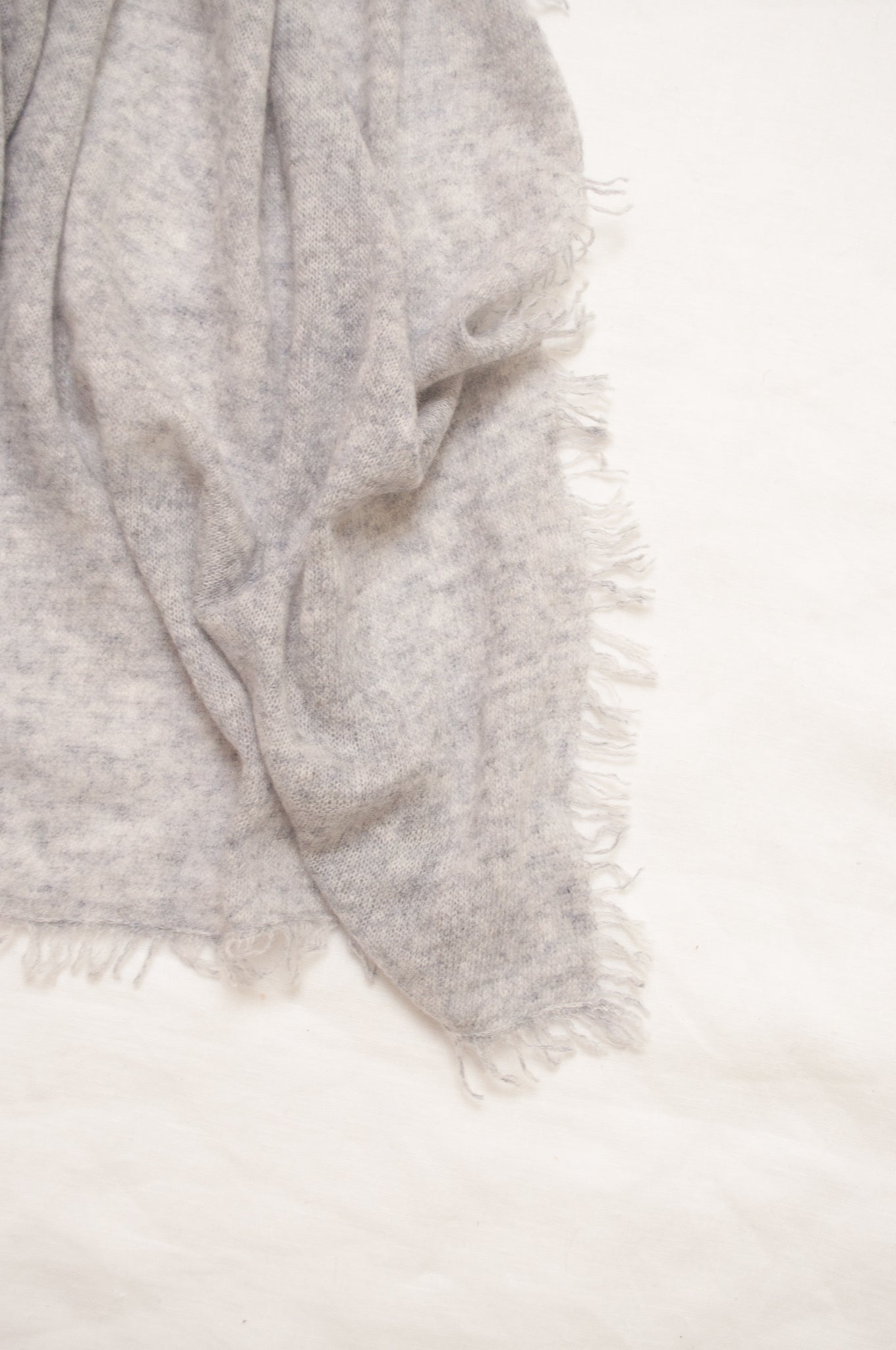 Pure cashmere, lightweight knit fringed scarf in ash grey.