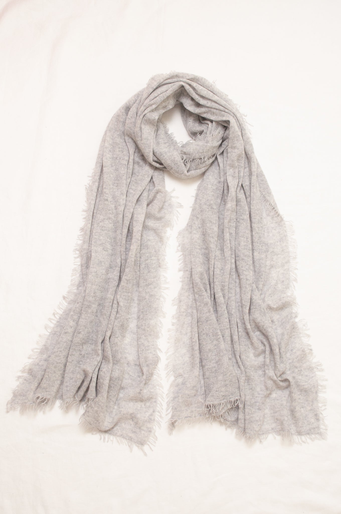 Pure cashmere, lightweight knit fringed scarf in ash grey.