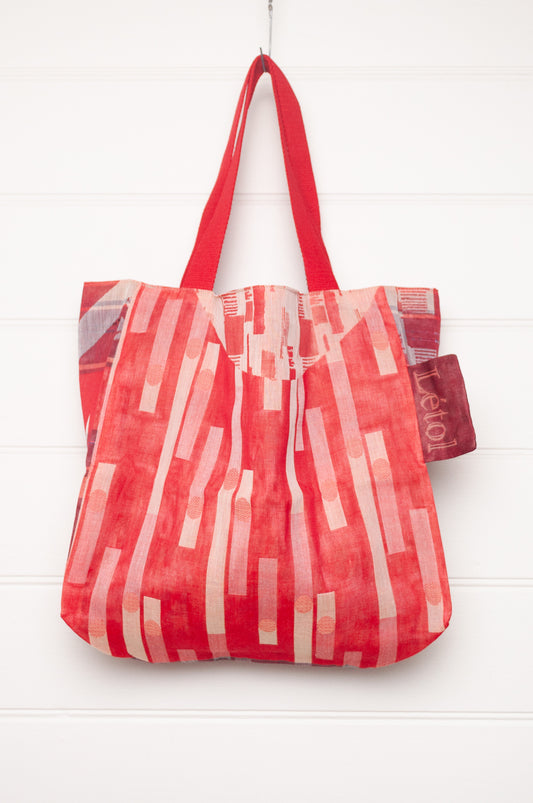 Letol organic cotton jacquard weave tote bag in foliage and stripes in red and pink.