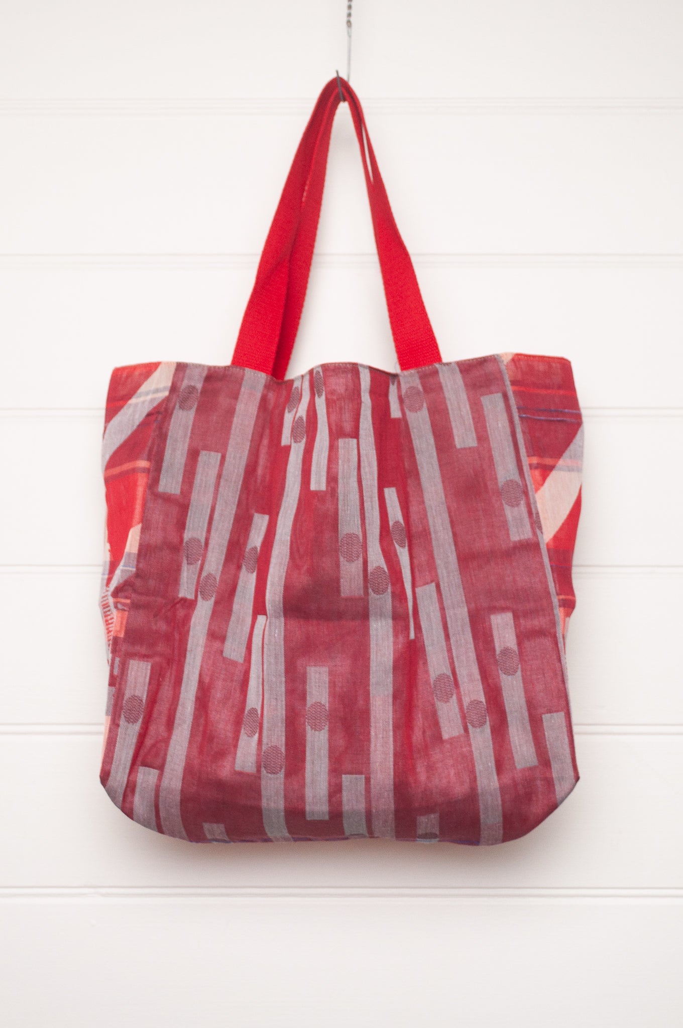 Letol organic cotton jacquard weave tote bag in foliage and stripes in red and pink.