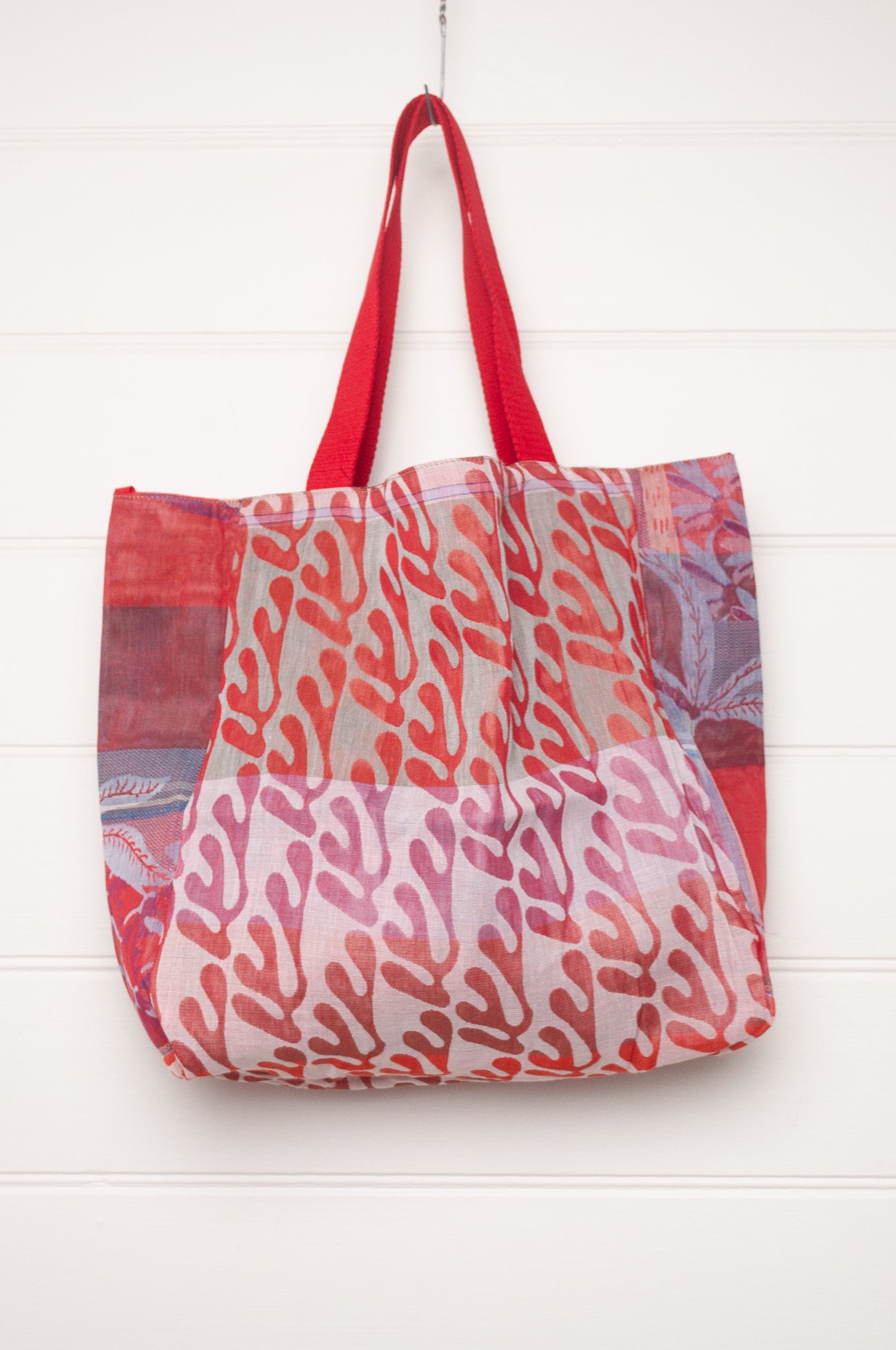 Letol organic cotton jacquard weave tote bag in foliage and stripes in red and pink.