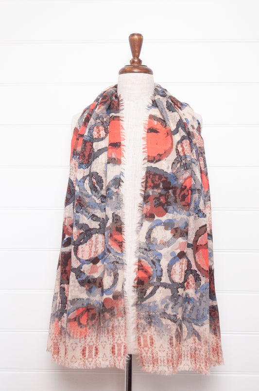 Colorful wool modal scarf with floral pattern on a white background
