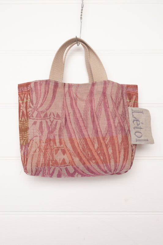 Letol organic cotton jacquard weave mini tote bag in foliage and stripes in tomato red and dusty pink.