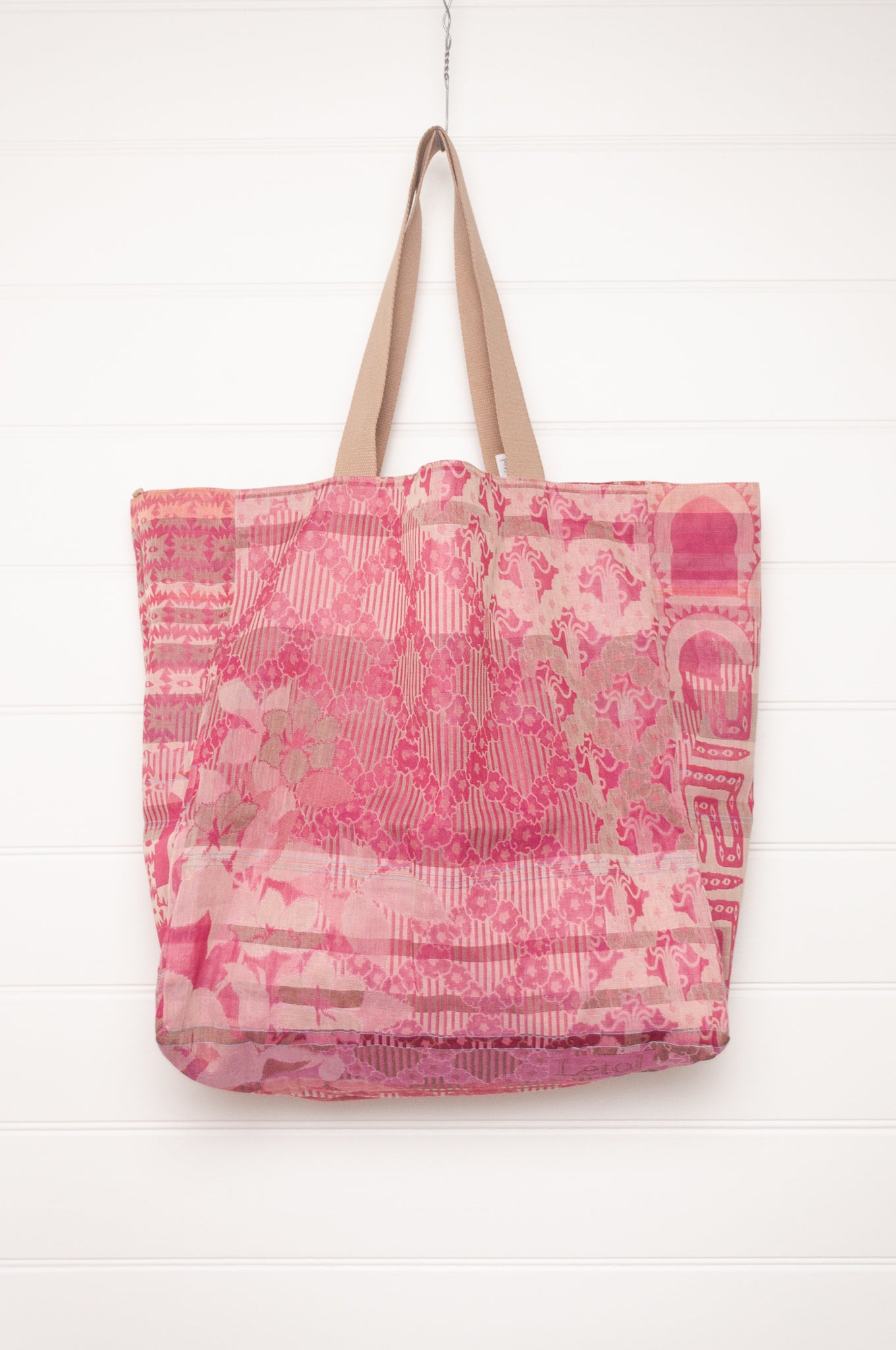 Letol organic cotton jacquard weave large tote bag in flowers and foliage in pinks and red.