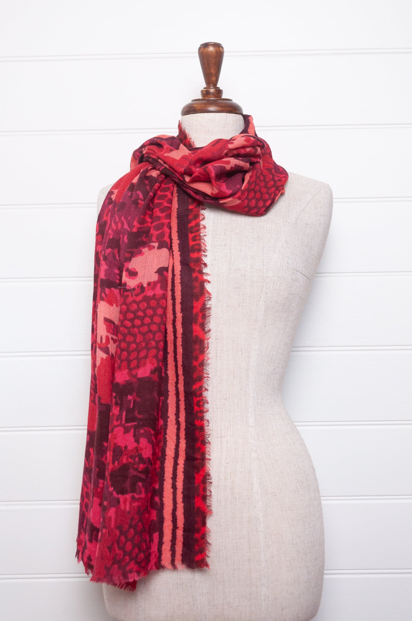 JH wool modal scarf pixeallated camouflage print in shades of red.