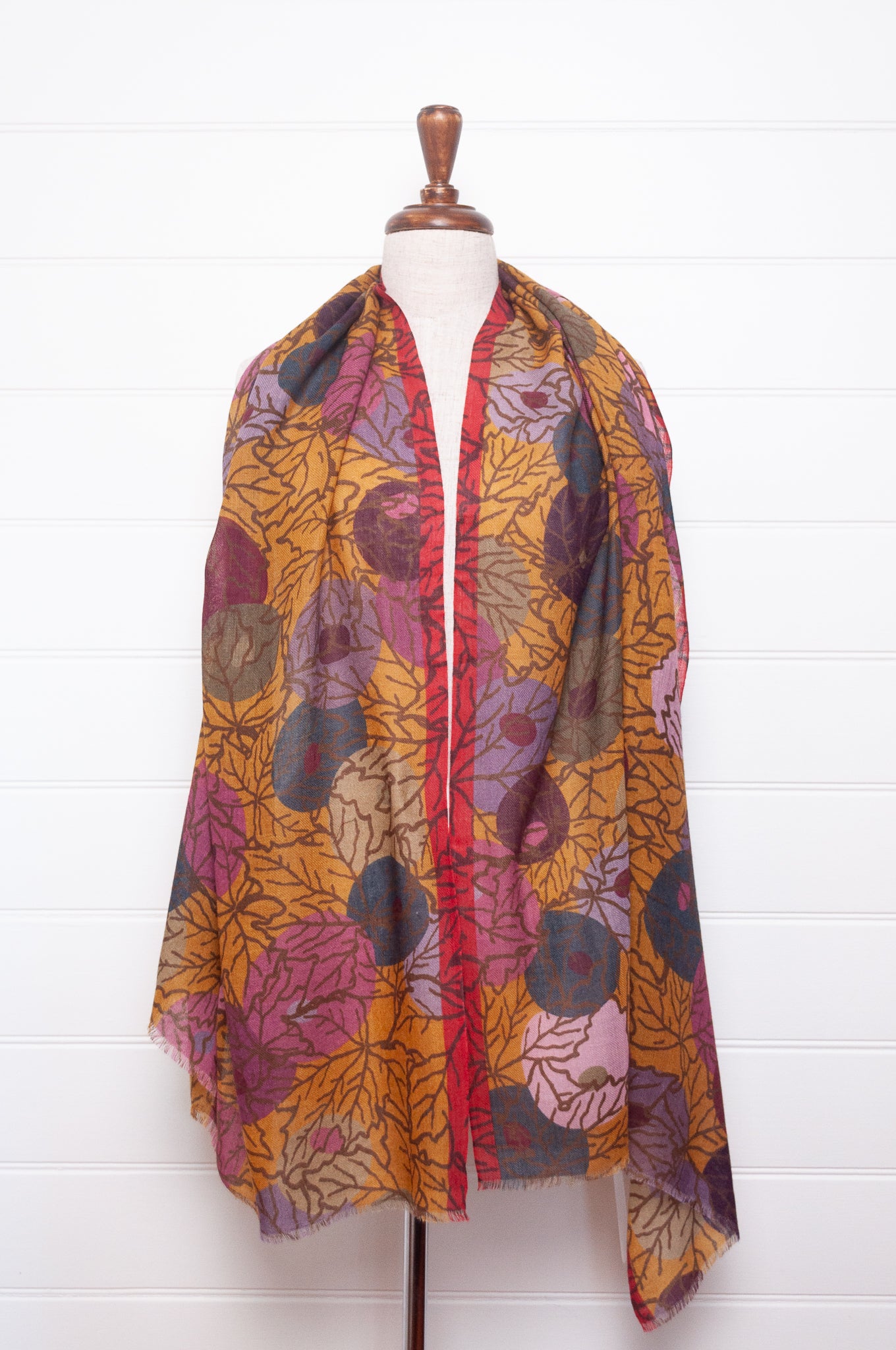 Fine wool modal scarf in autumn tones featuring berry print.