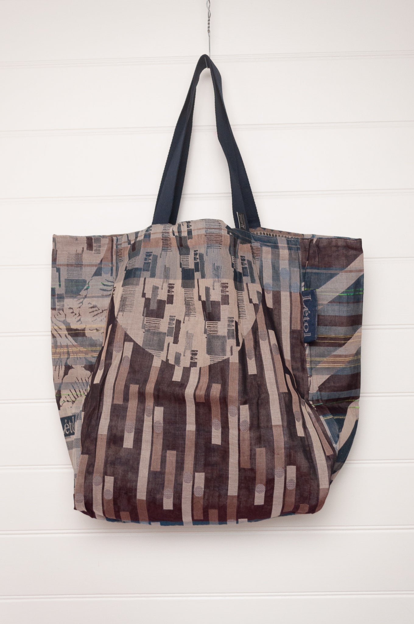 Letol organic cotton jacquard weave large tote bag in tartan flowers and stripes in blues and brown.