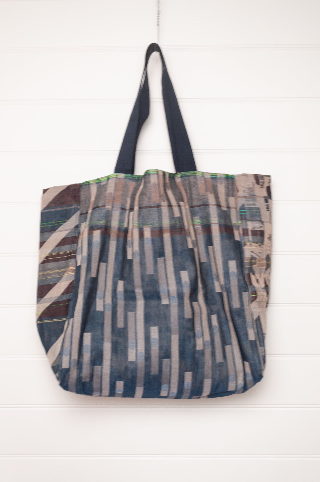 Letol organic cotton jacquard weave large tote bag in tartan flowers and stripes in blues and brown.