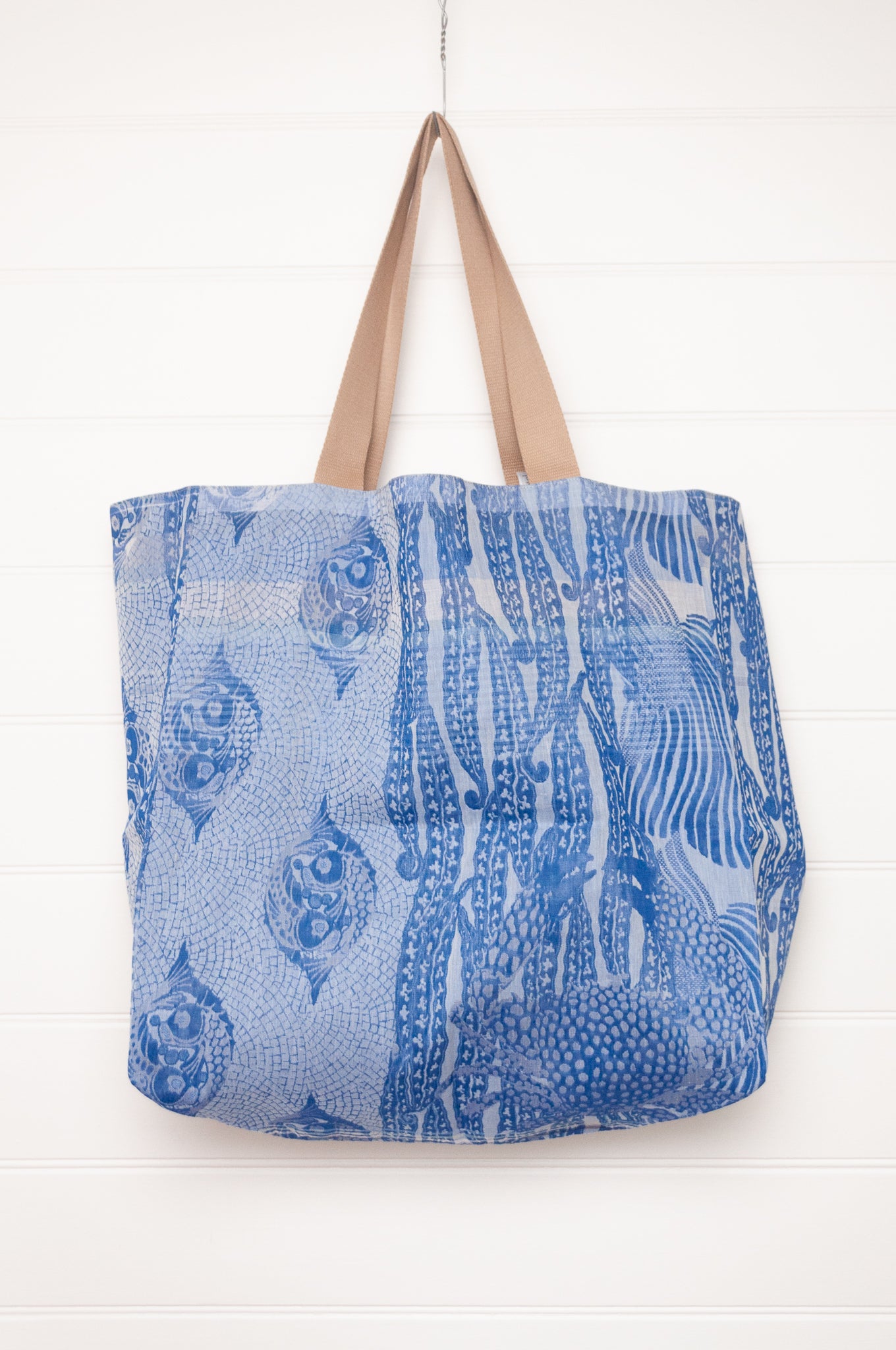 Letol organic cotton jacquard weave large tote bag in flowers and foliage in cobalt and sapphire blue.