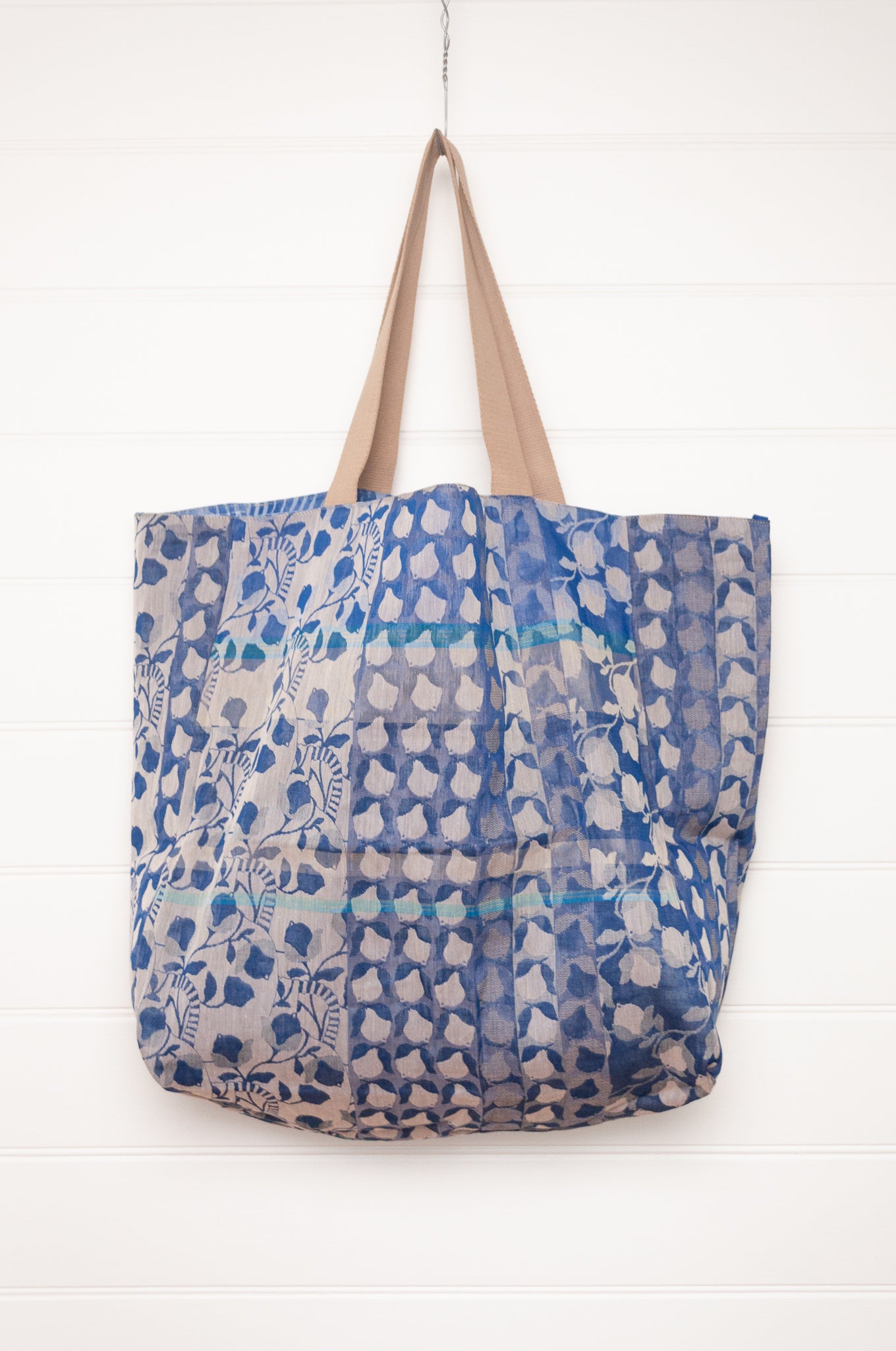 Letol organic cotton jacquard weave large tote bag in flowers and foliage in cobalt and sapphire blue.