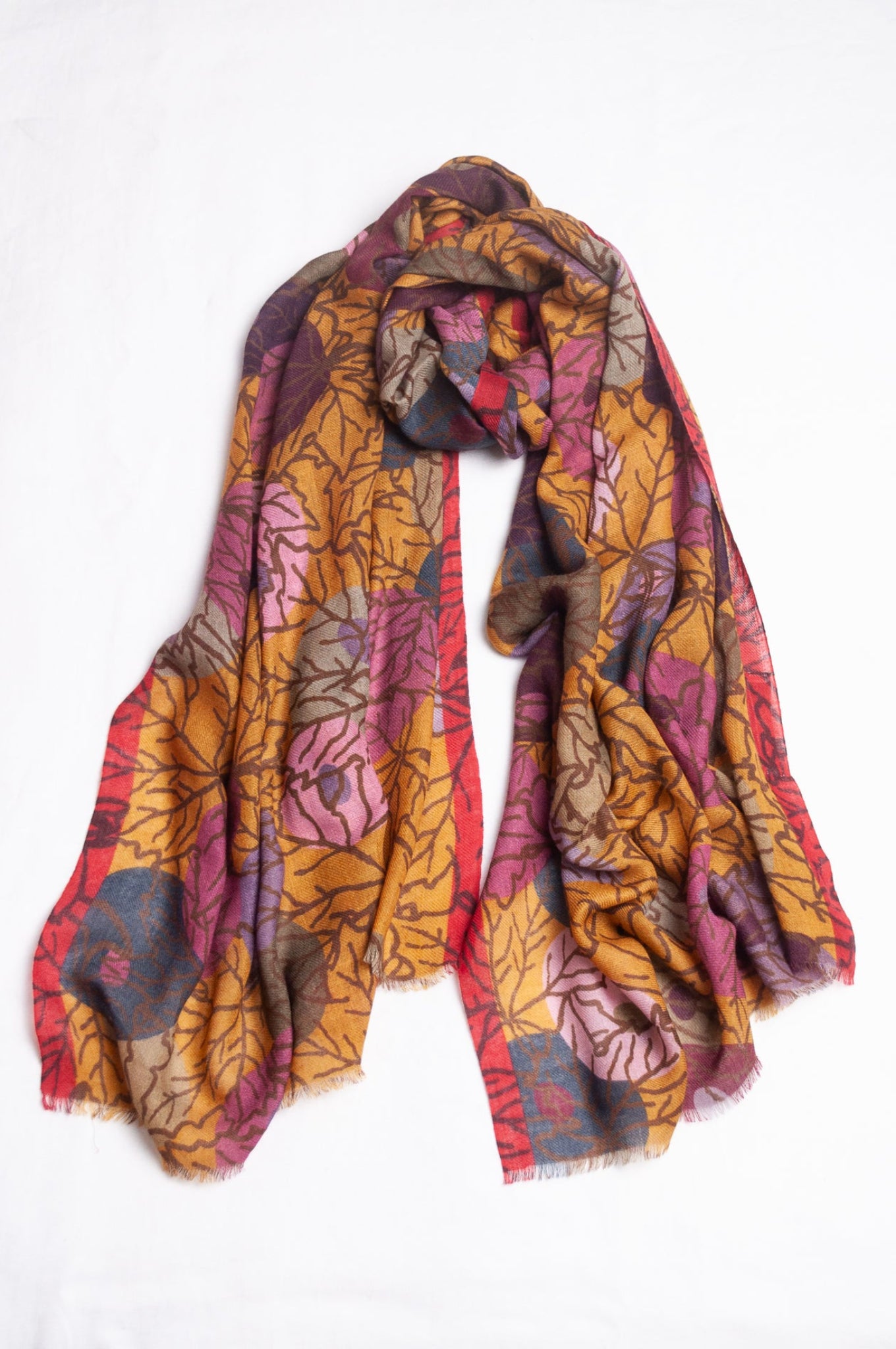 Fine wool modal scarf in autumn tones featuring berry print.