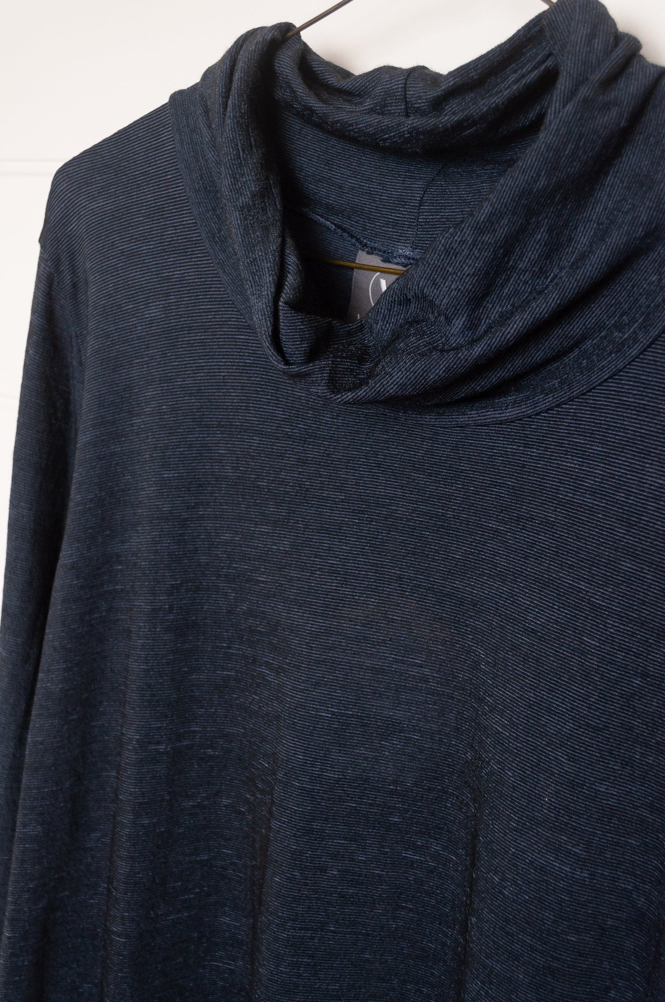 Valia merino wool knit high neck top in deep denim blue.