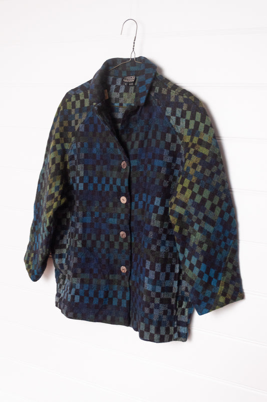 NK handwoven wool tailored button up jacket in deep blue and green checks. 