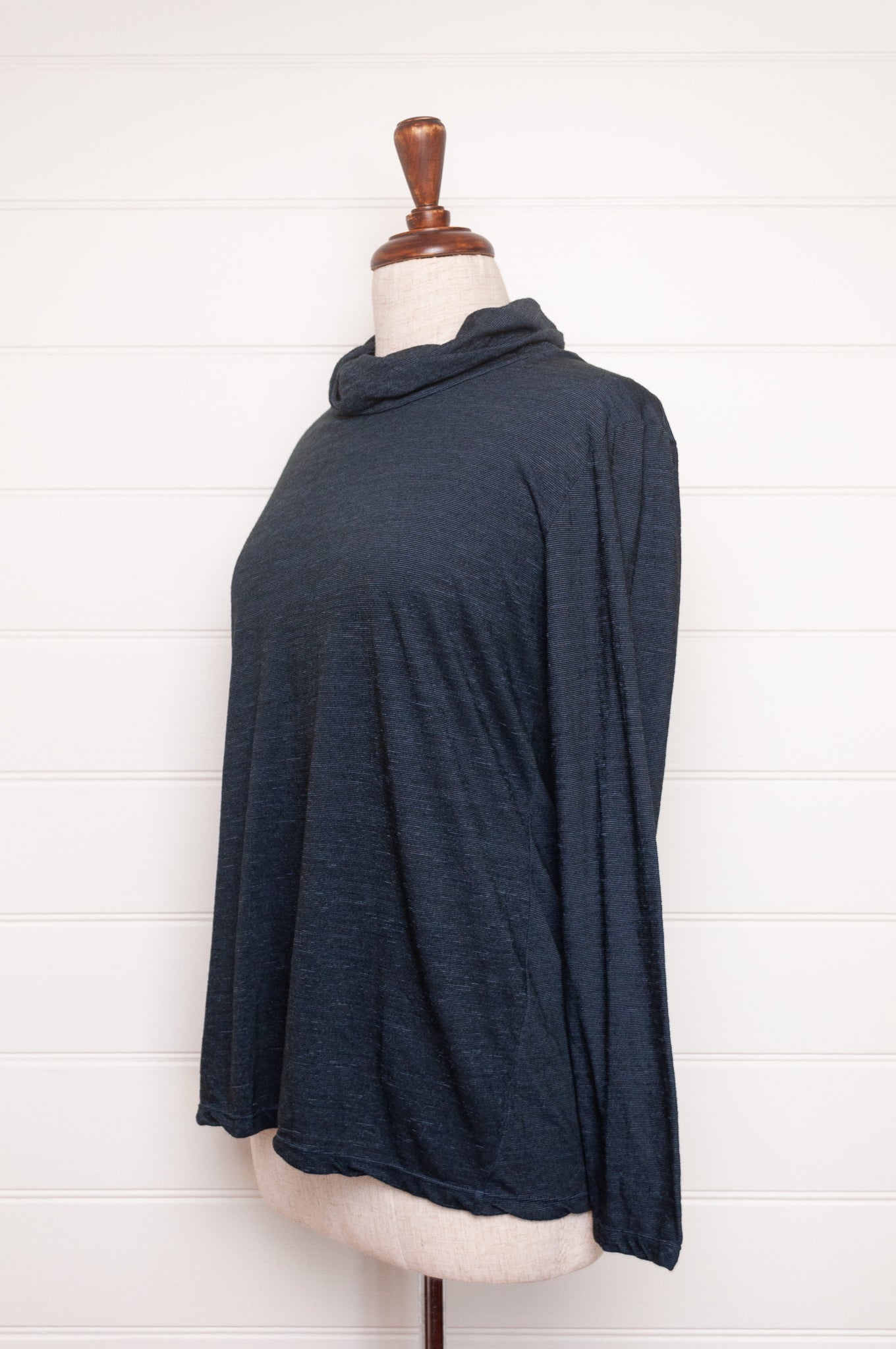 Valia merino wool knit high neck top in deep denim blue.