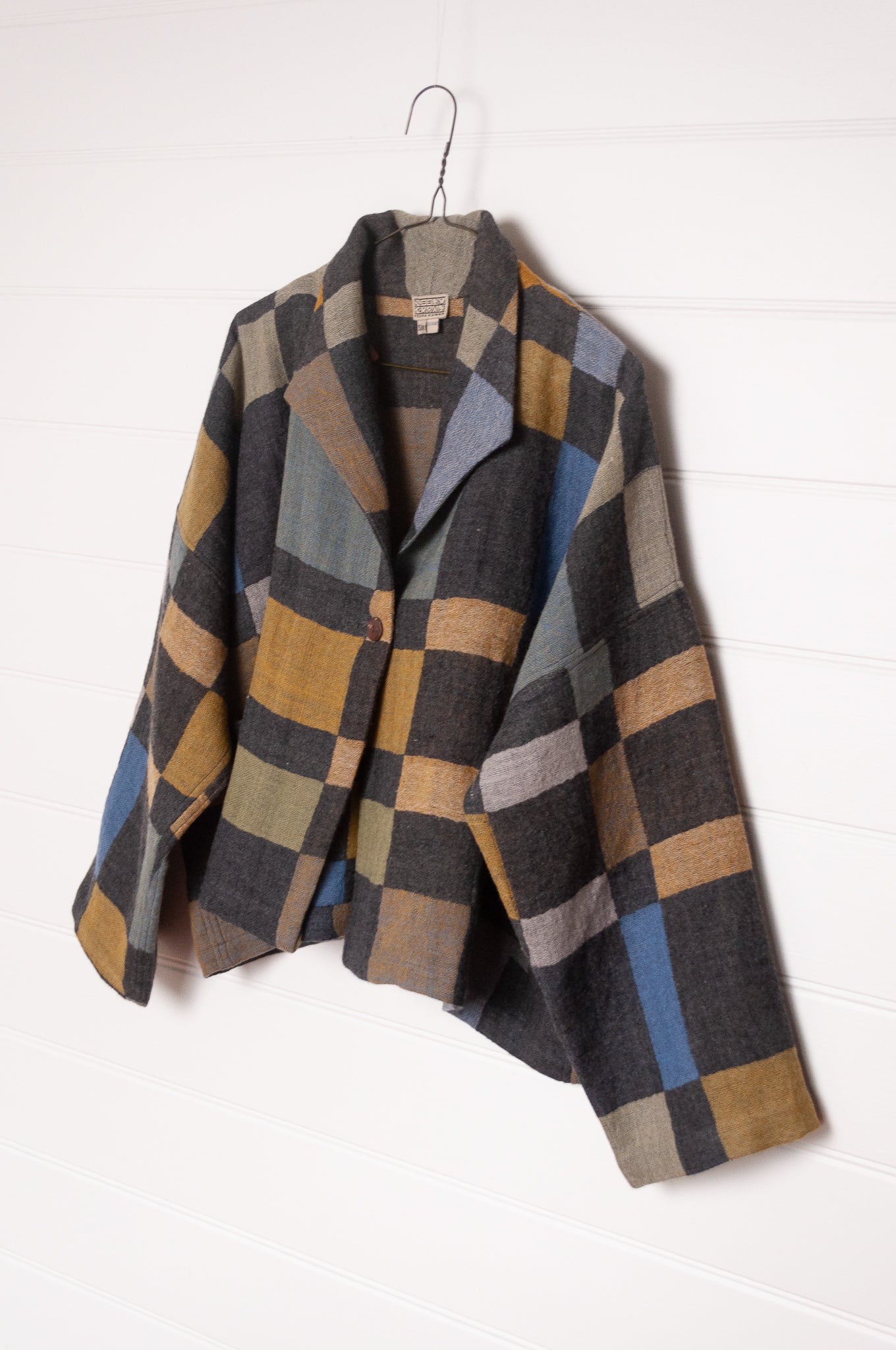 NK Coco handwoven wool jacket in charcoal and cool winter shades blanket checks. 