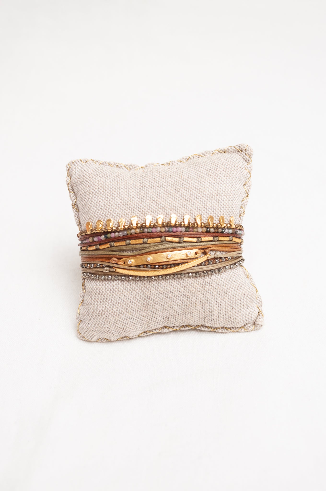 Mary Gaitani made in Greece waxed cord bracelet with gold charms and semi-precious stones.