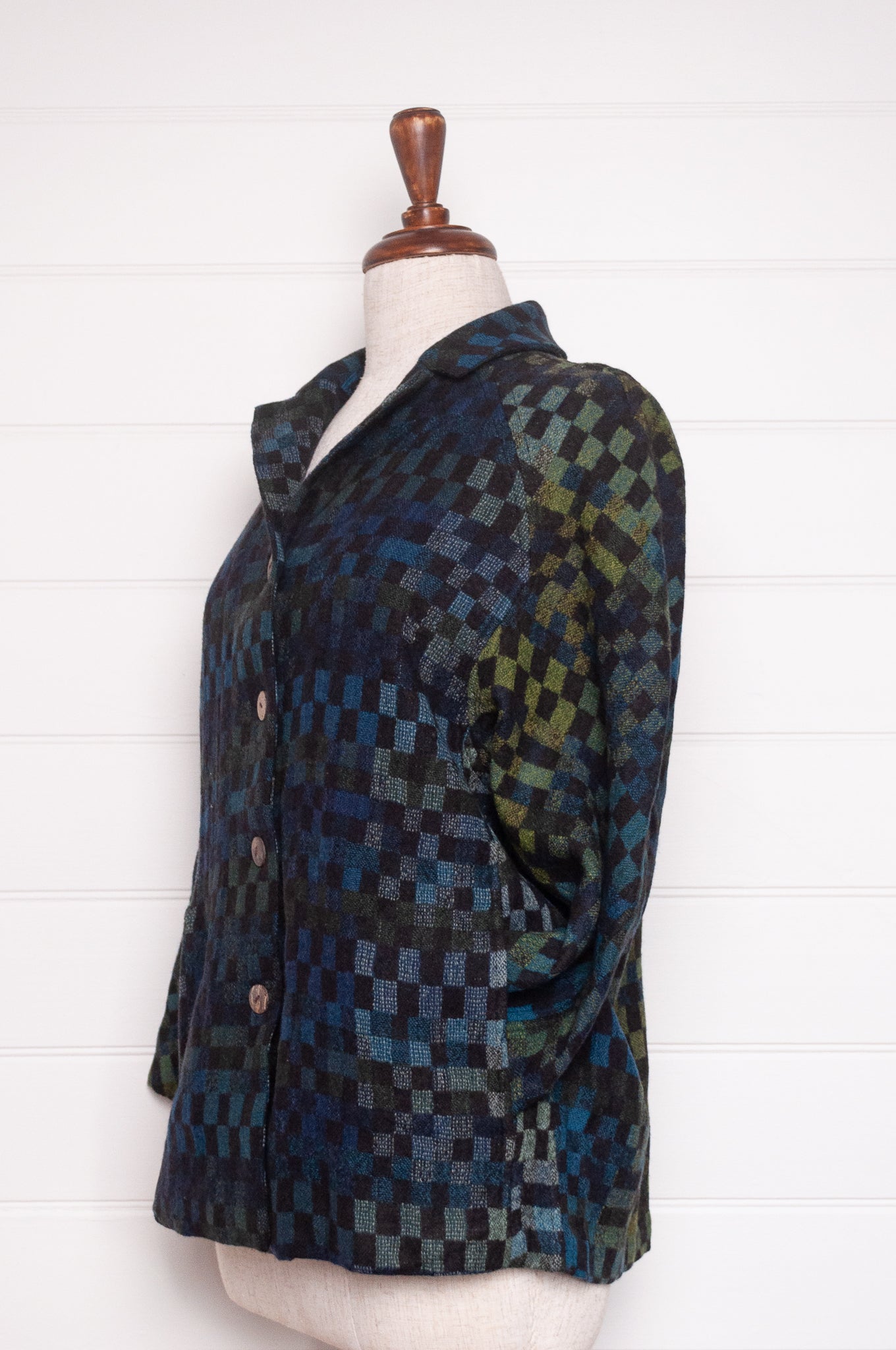 NK handwoven wool tailored button up jacket in deep blue and green checks. 