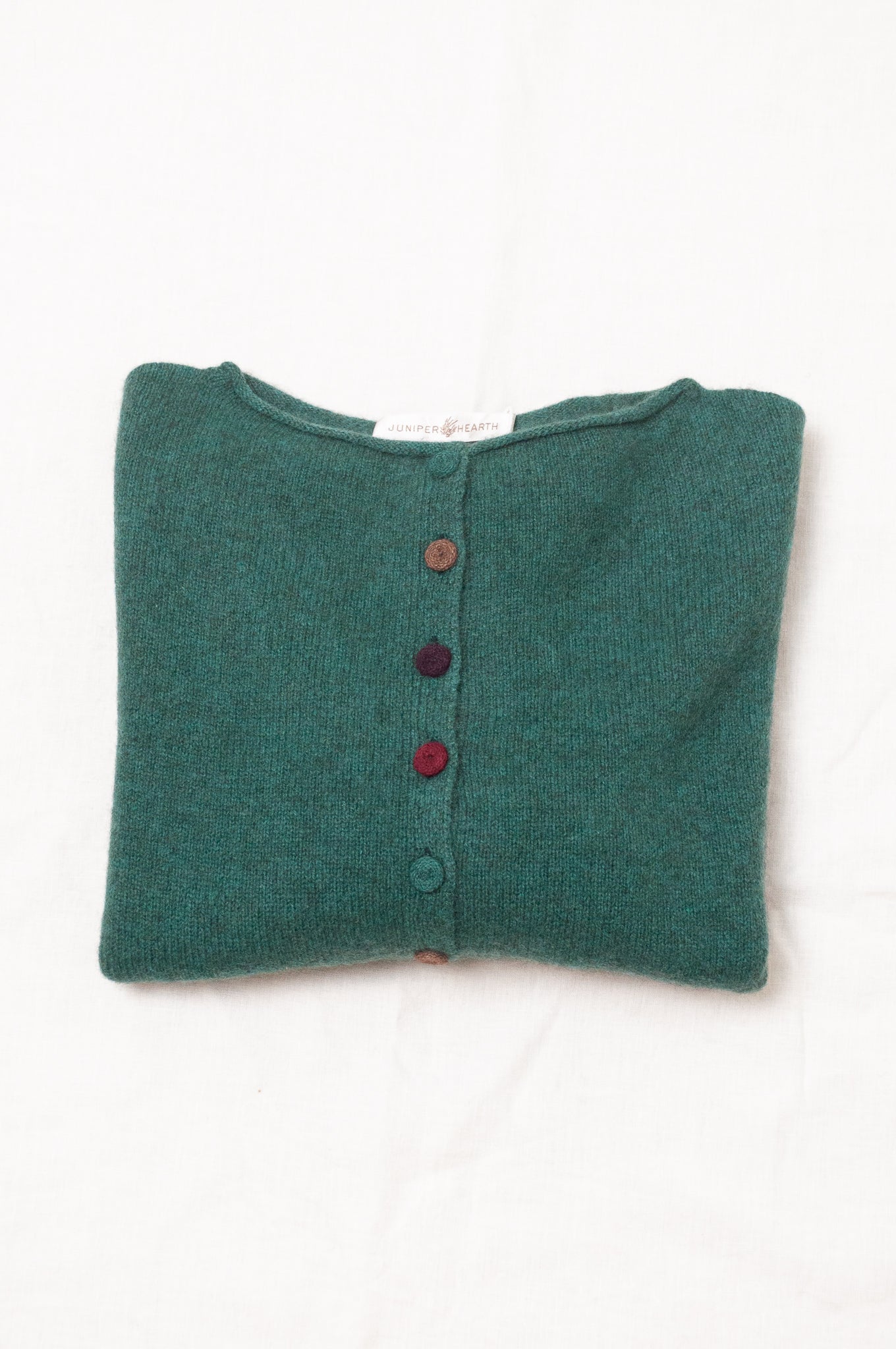 Baby yak wool one size reversible cardigan sweater in emerald green.
