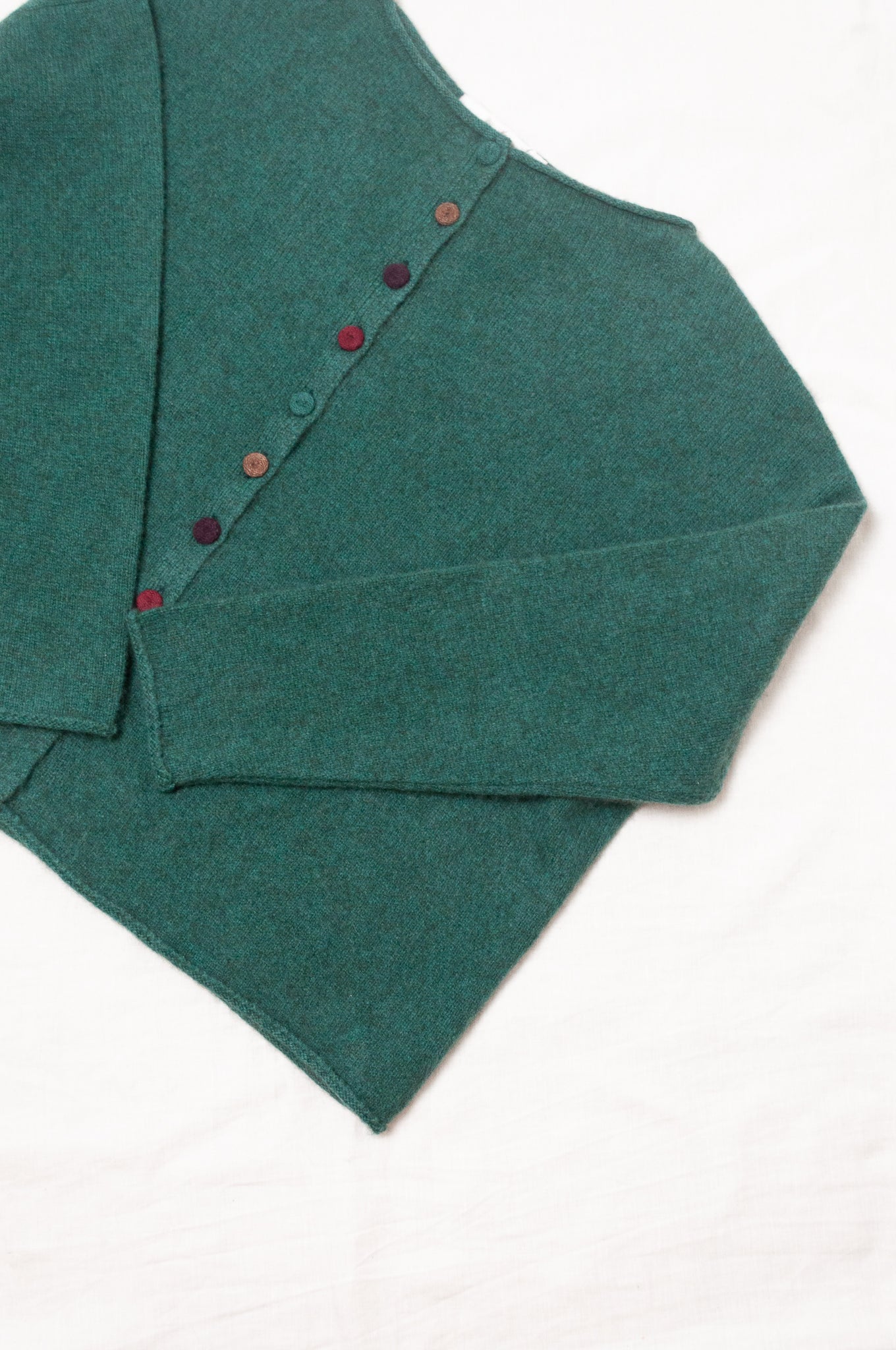 Baby yak wool one size reversible cardigan sweater in emerald green.