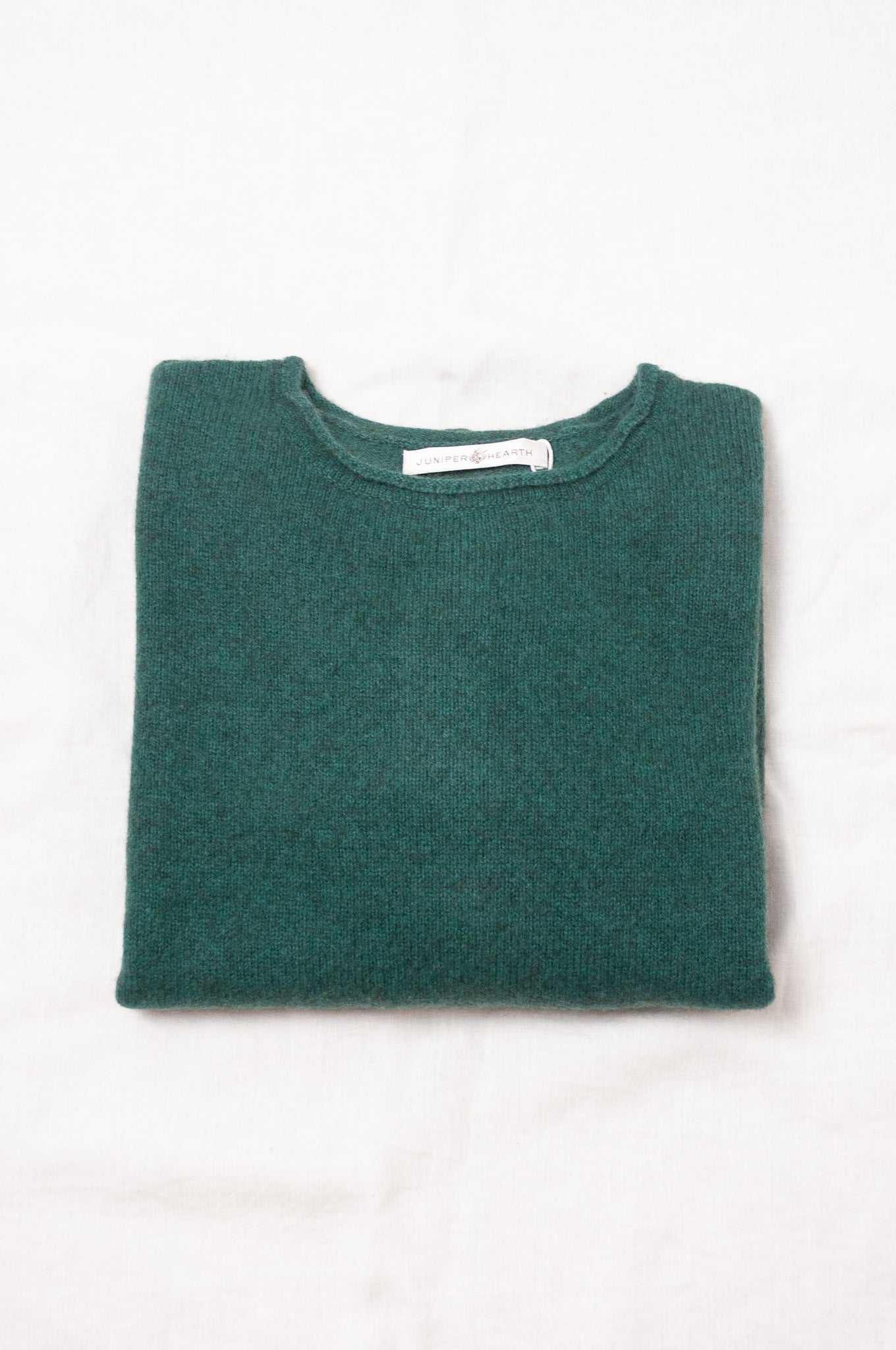 Baby yak Iris round neck sweater in emerald green.