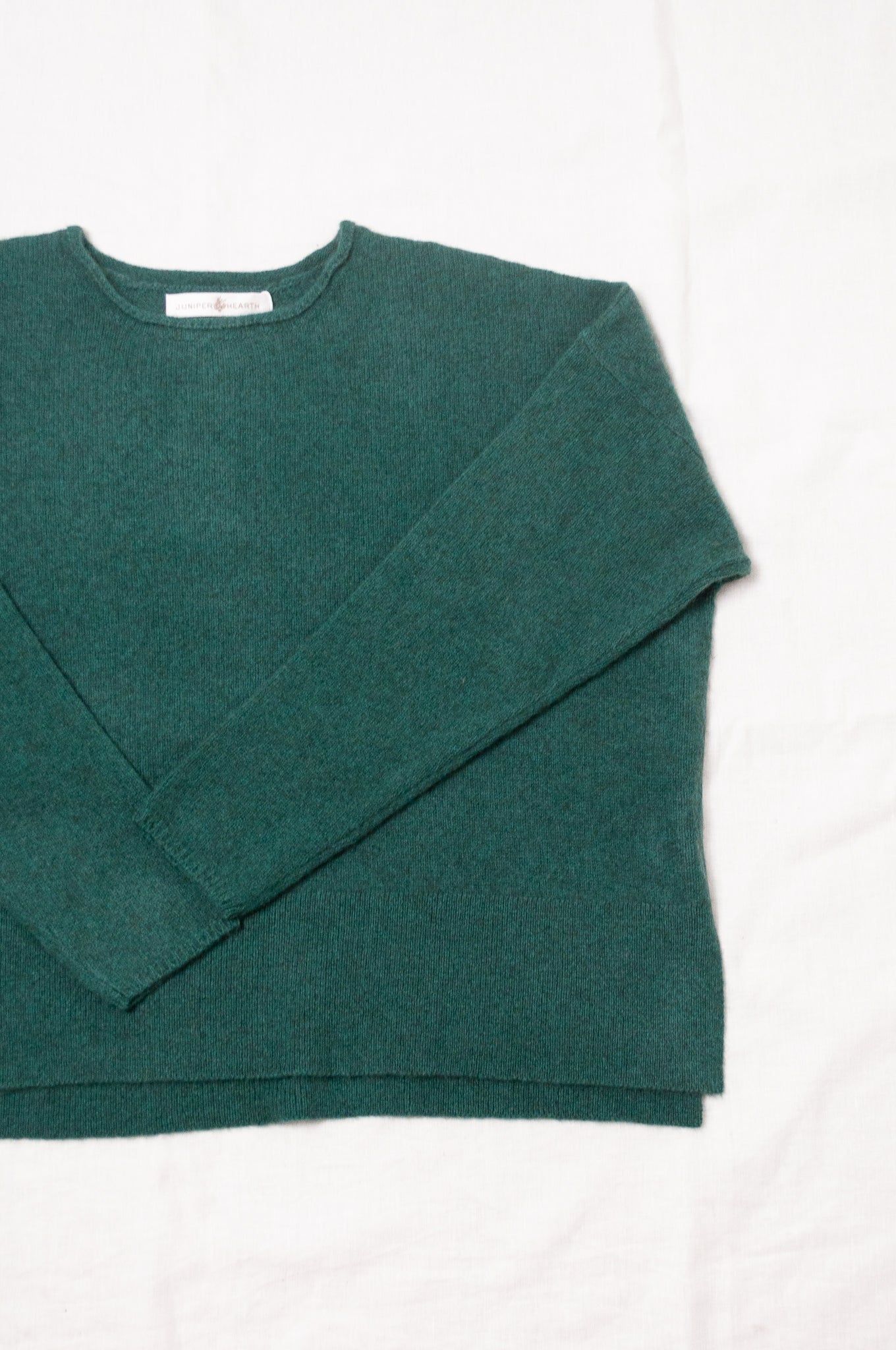 Baby yak Iris round neck sweater in emerald green.