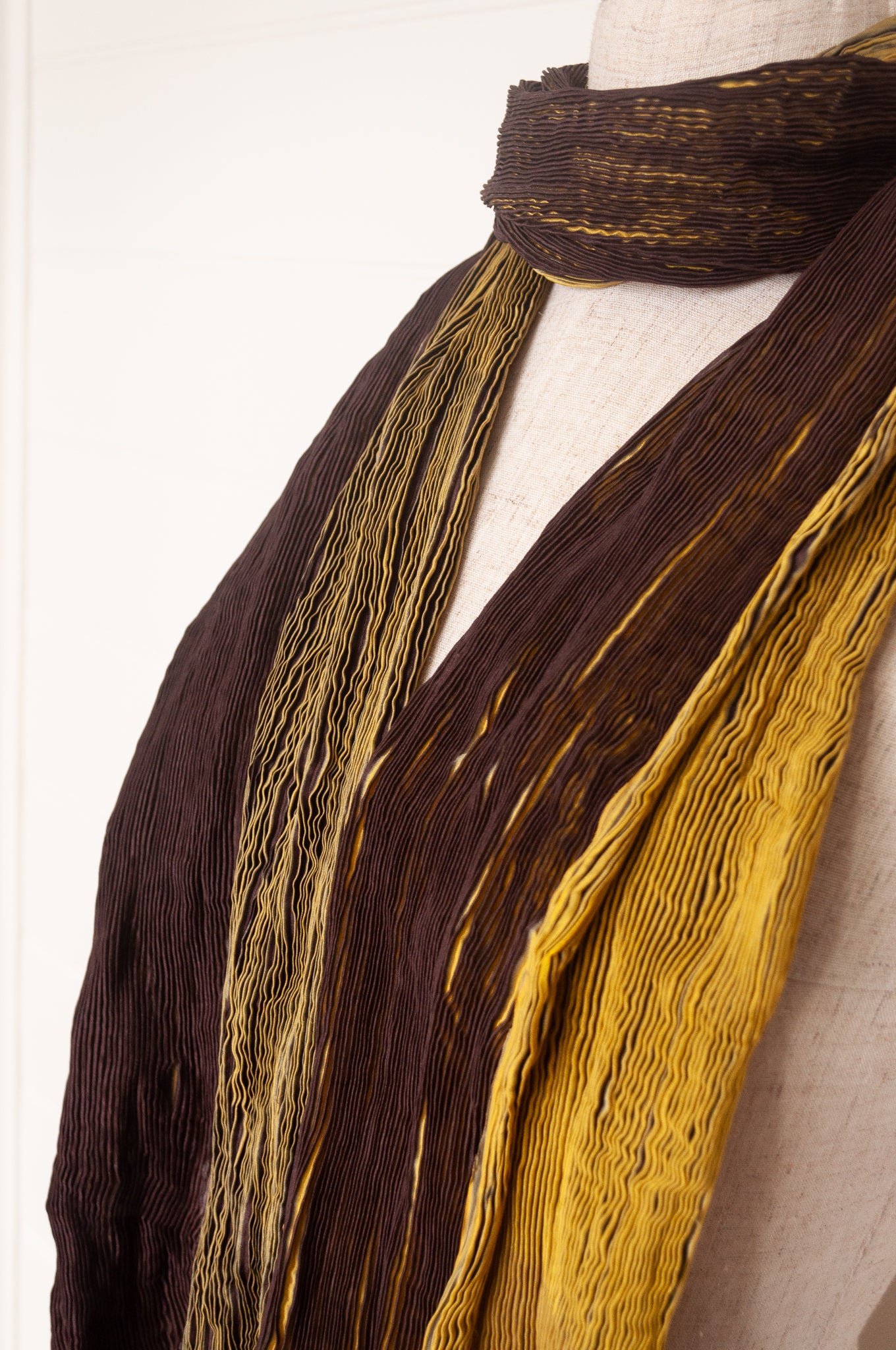 Neeru Kumar crinkle silk shibori scarf in chocolate brown and golden yellow.
