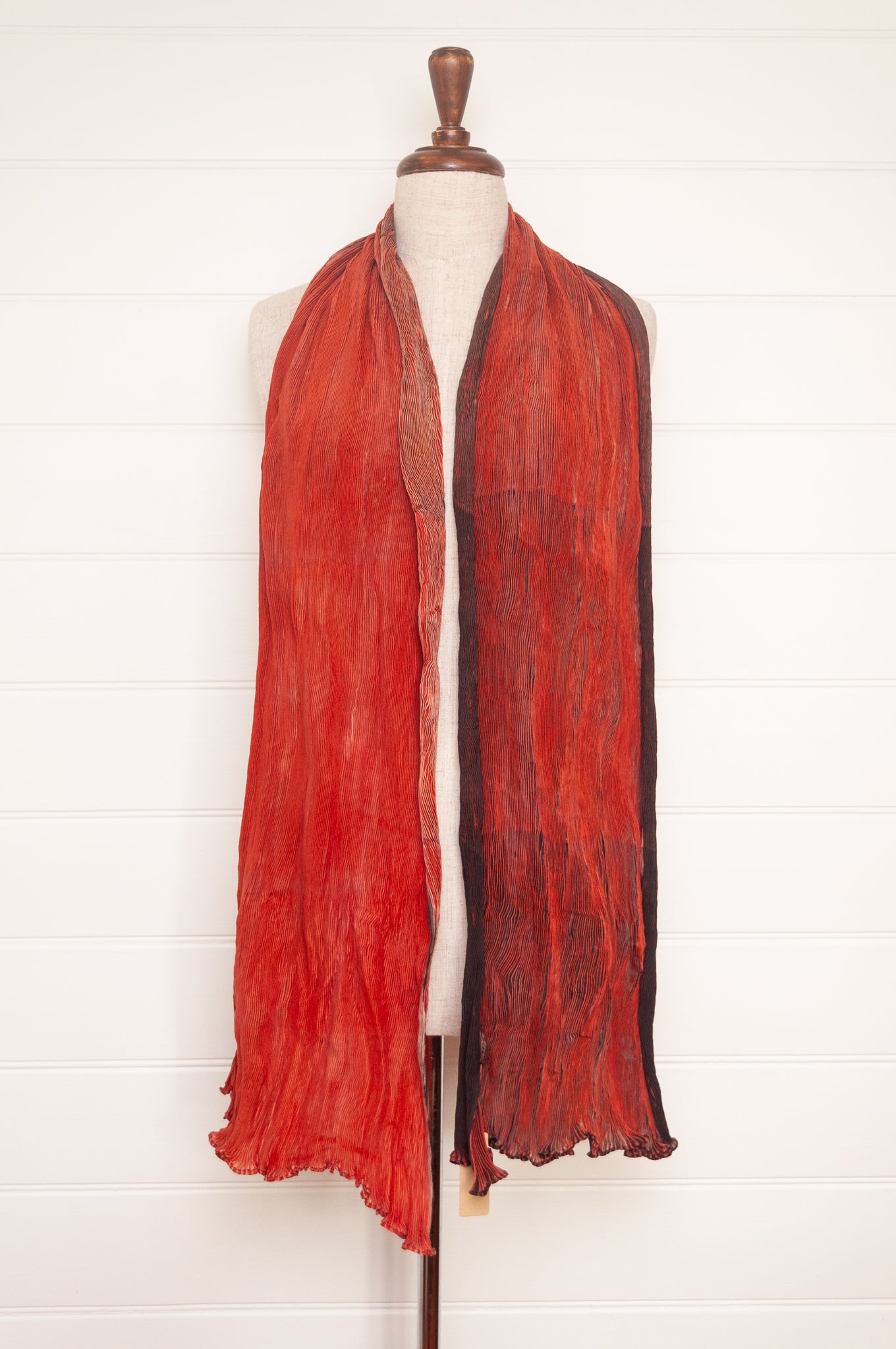 Neeru Kumar crinkle silk shibori scarf in pomegranate shades of red.