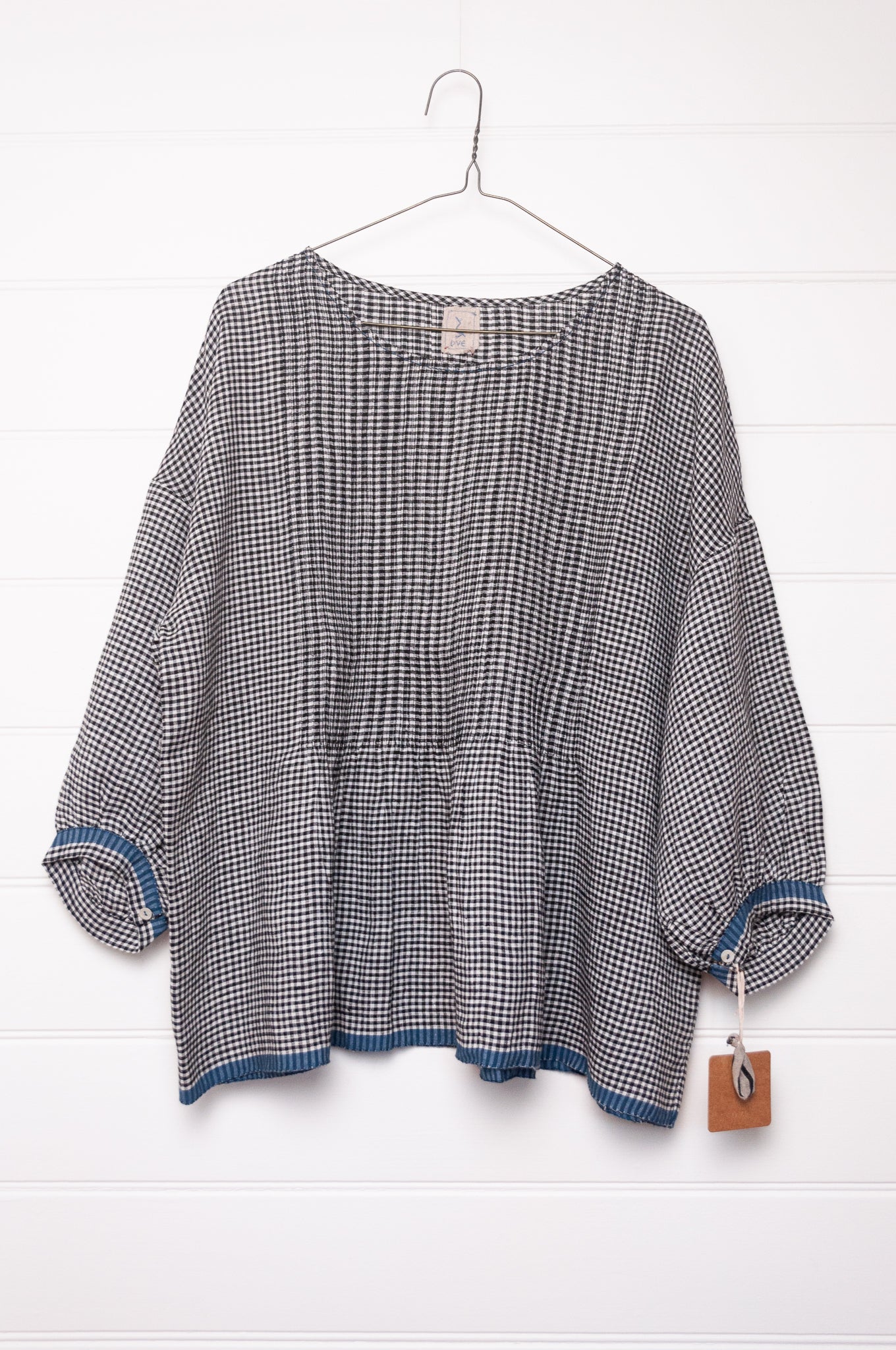 DVE Anisha pintucked top in black and white gingham check linen hand stitched details and blue selvedge.