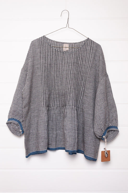 DVE Anisha pintucked top in black and white gingham check linen hand stitched details and blue selvedge.