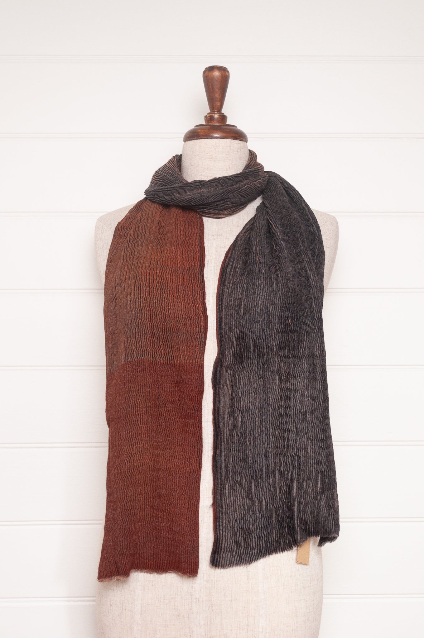 NK Shibori dyed wool scarf in chestnut brown and charocal, pleat finish.