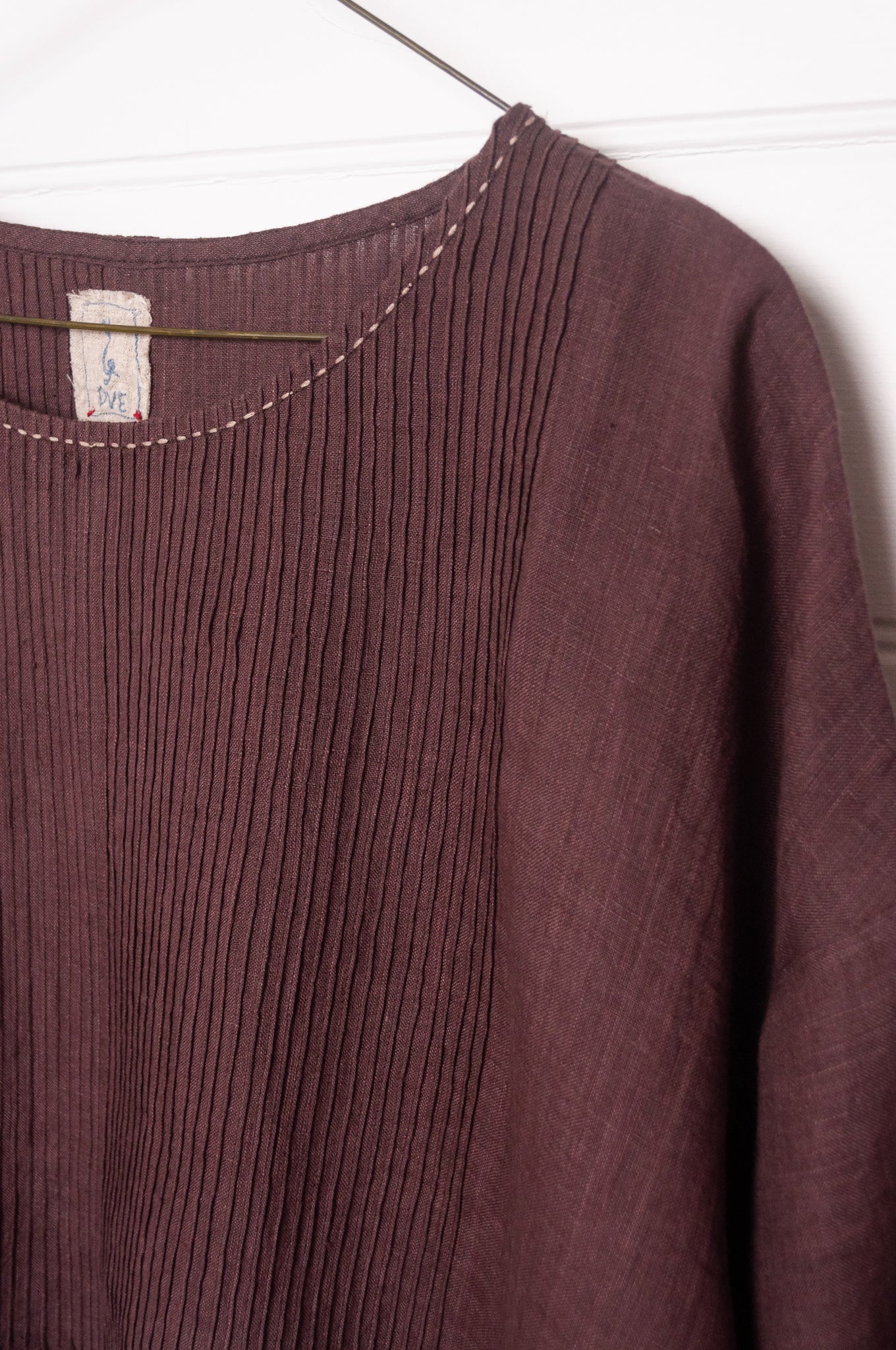 DVE Anisha pintucked top in chocolate brown linen hand stitched details.