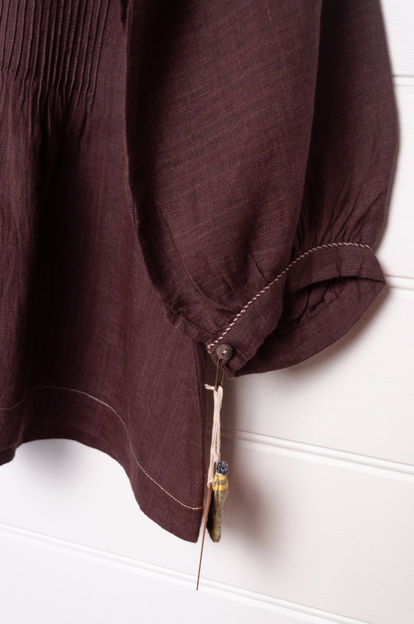 DVE Anisha pintucked top in chocolate brown linen hand stitched details.