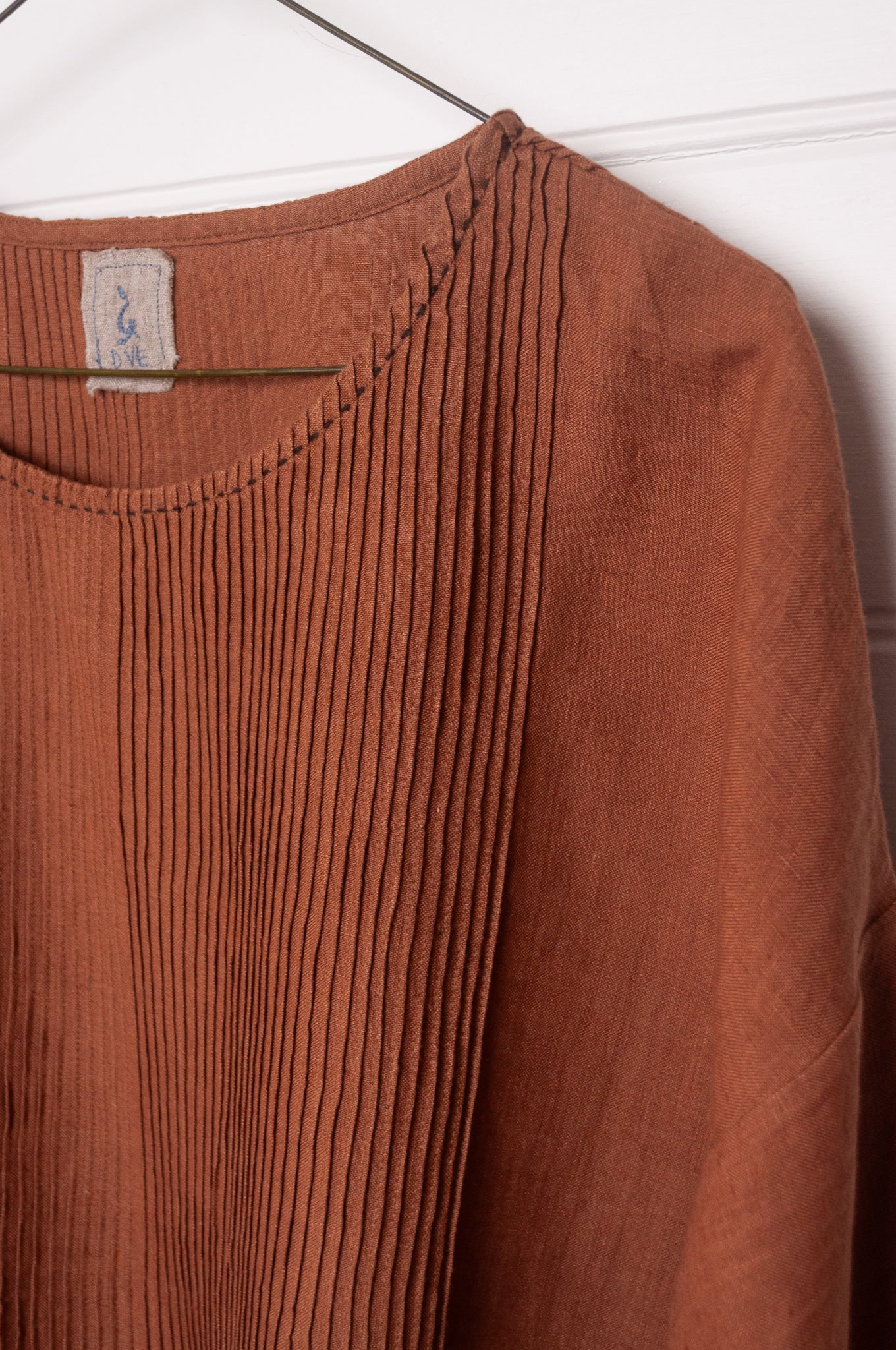 DVE Anisha pintucked top in French beige brown linen hand stitched details.