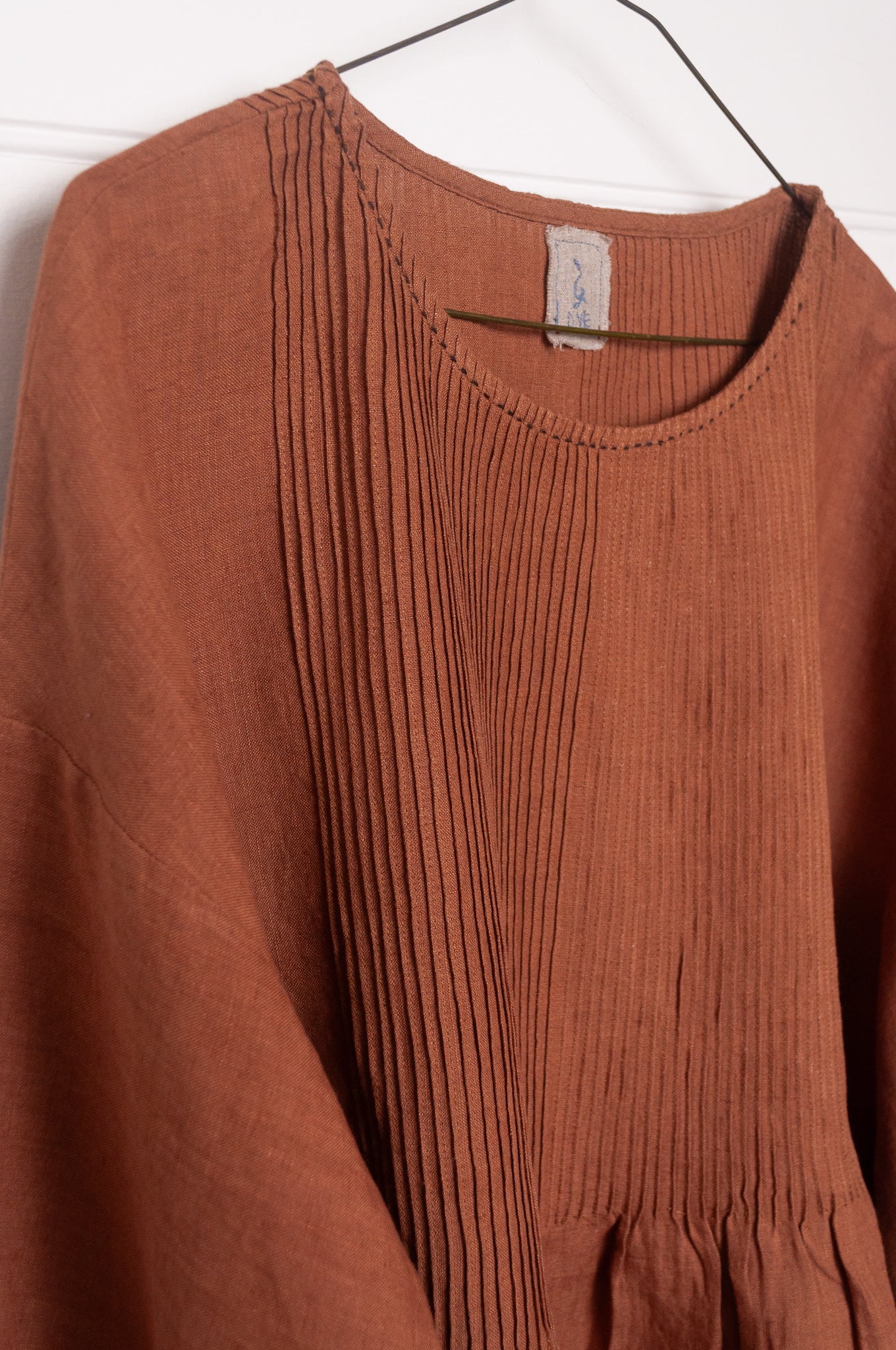 DVE Anisha pintucked top in French beige brown linen hand stitched details.