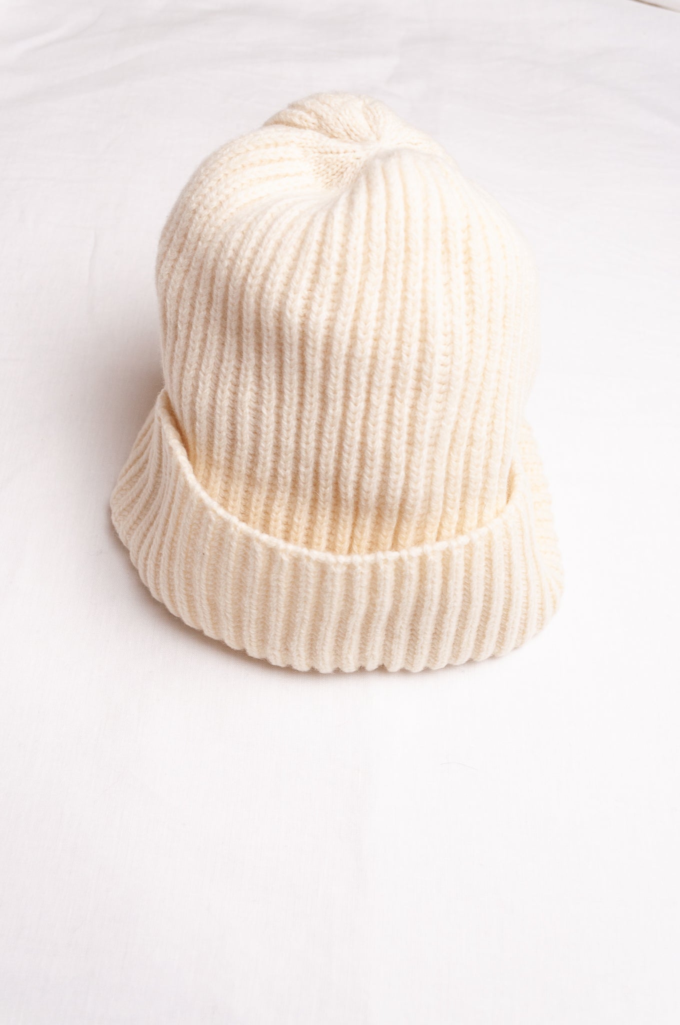 PCNQ pure wool ivory beanie bonnet.