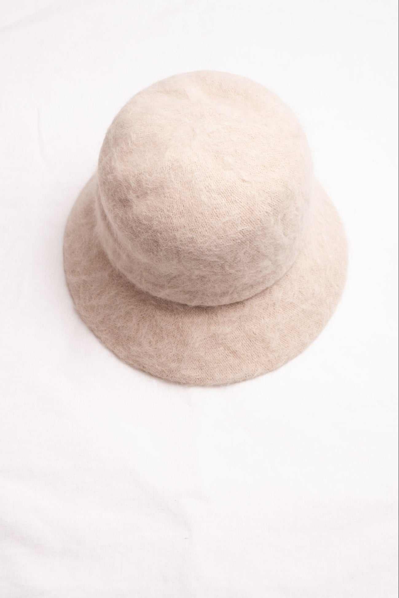 PCNQ Mash hat in cream beige angora wool.