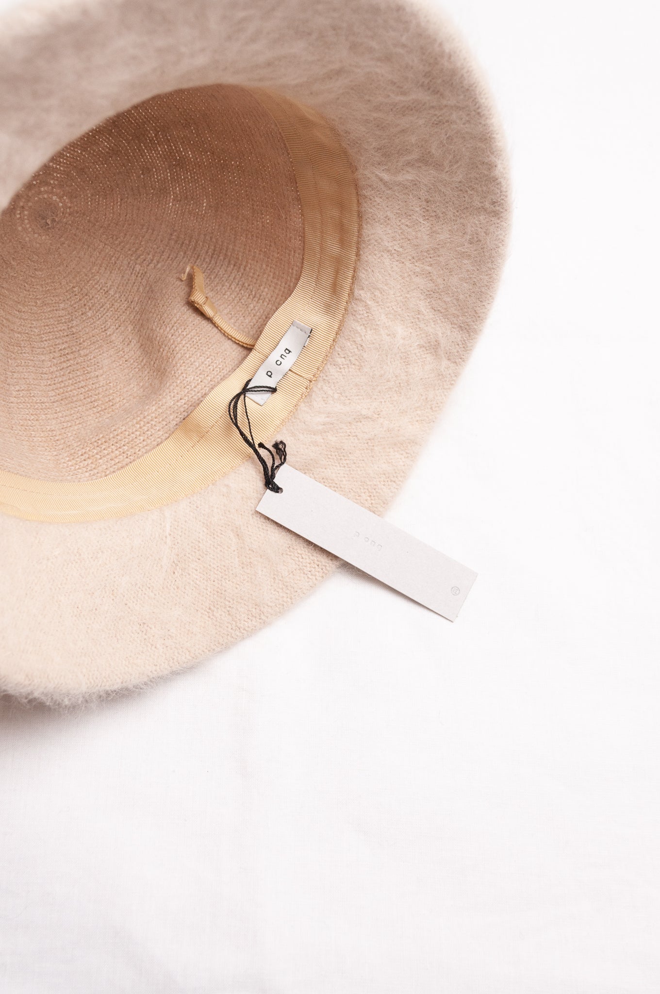 PCNQ Mash hat in cream beige angora wool.