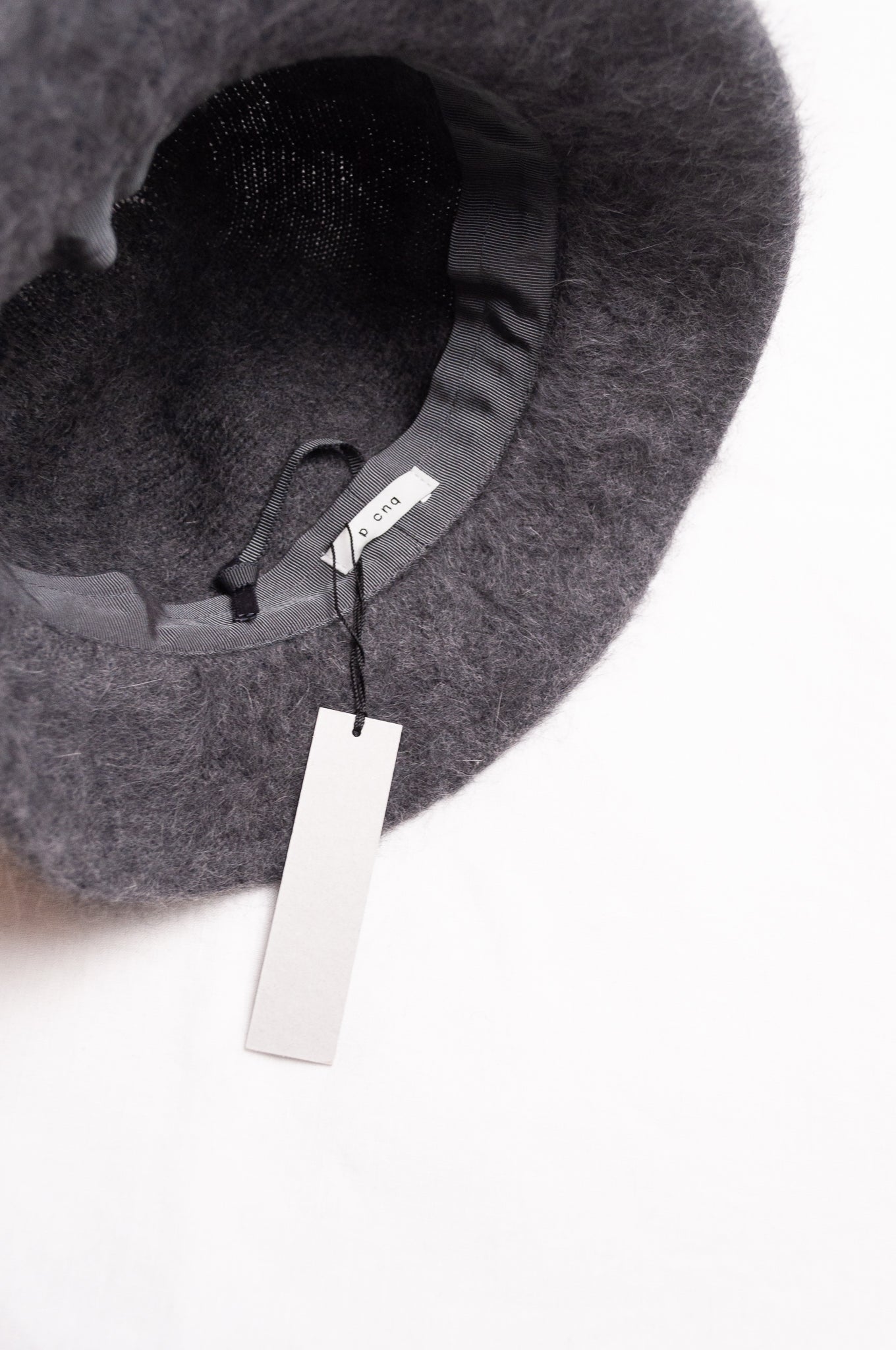 PCNQ Mash angora blend charcoal grey hat.