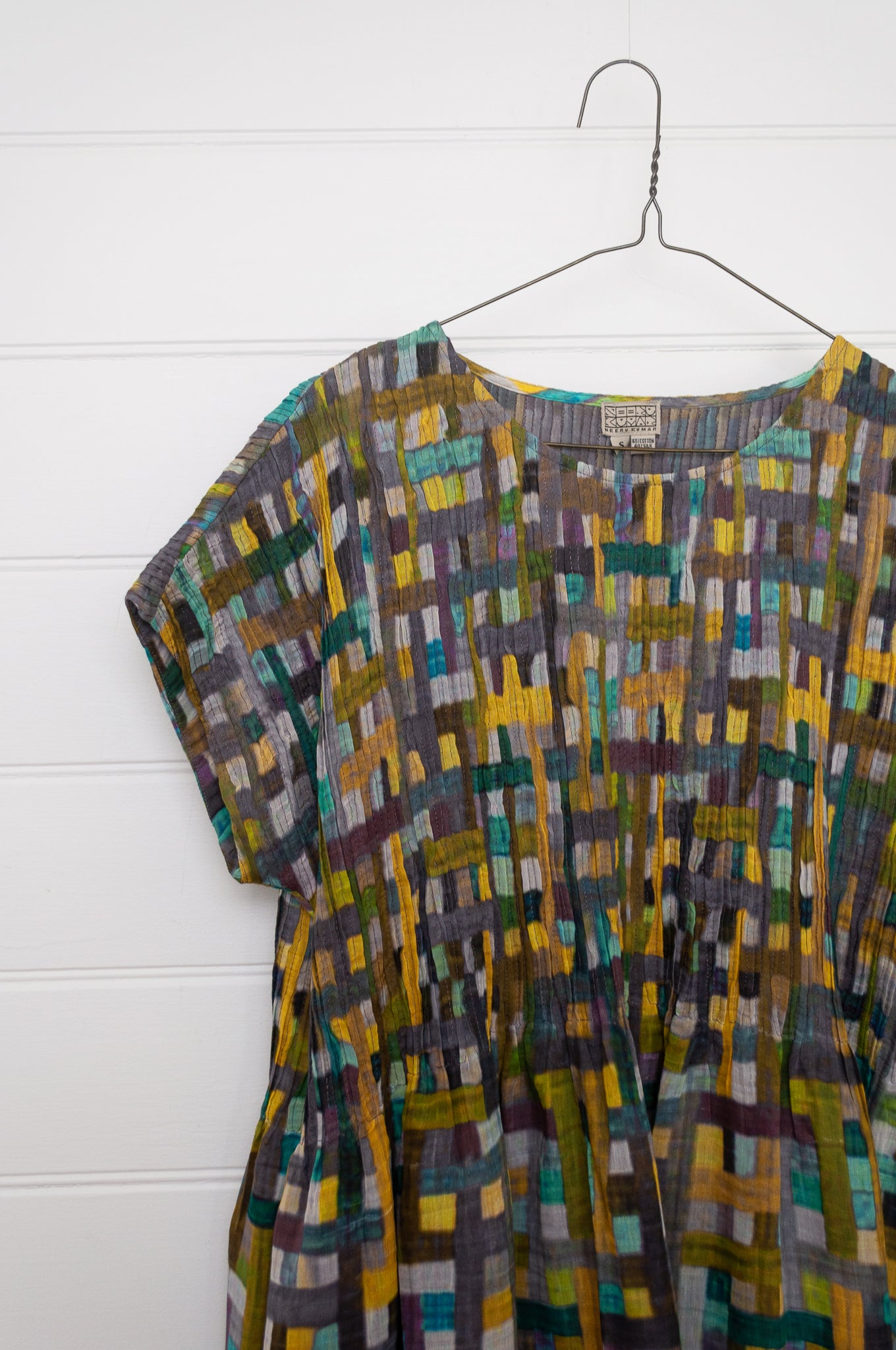 Neeru Kumar cotton silk pintucked short sleeved dress in multi check design.