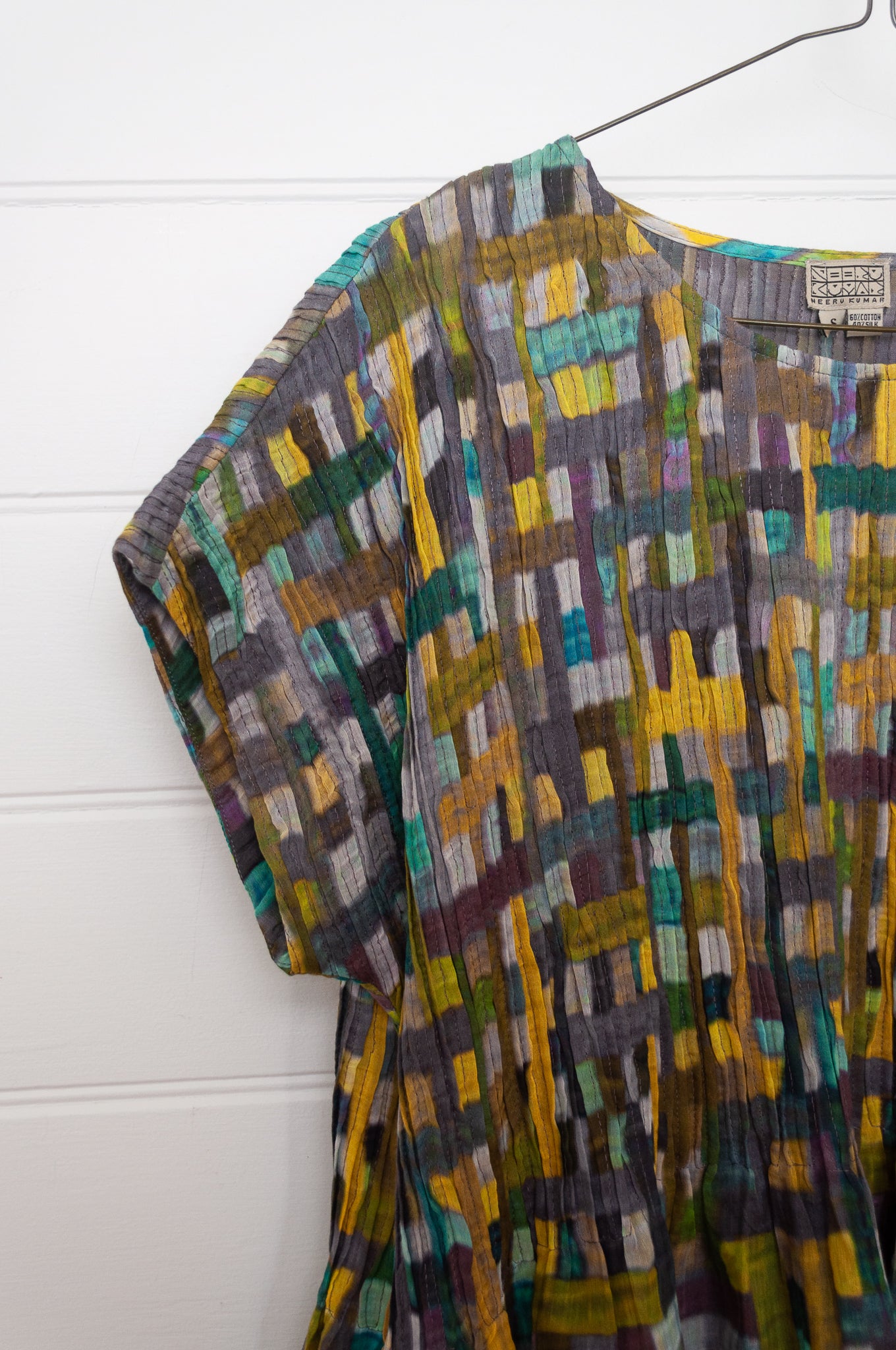 Neeru Kumar cotton silk pintucked short sleeved dress in multi check design.