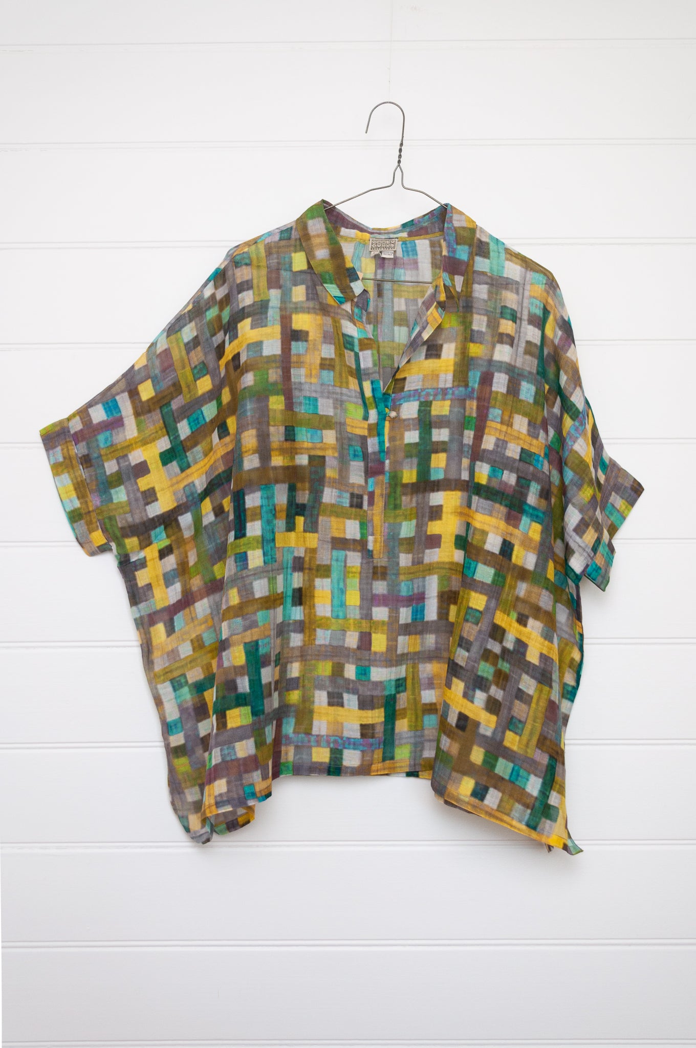Neeru Kumar fine cotton silk loose fitting blouse shirt in multi coloured check.